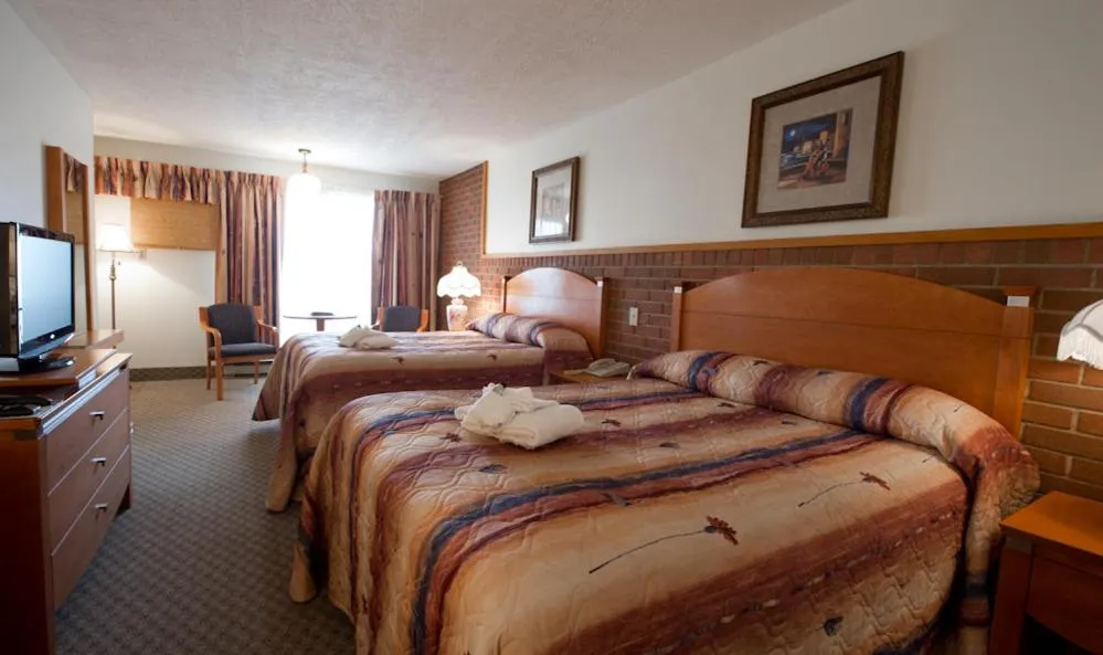 Photo of the whole room, Bed in Motel Du Chevalier