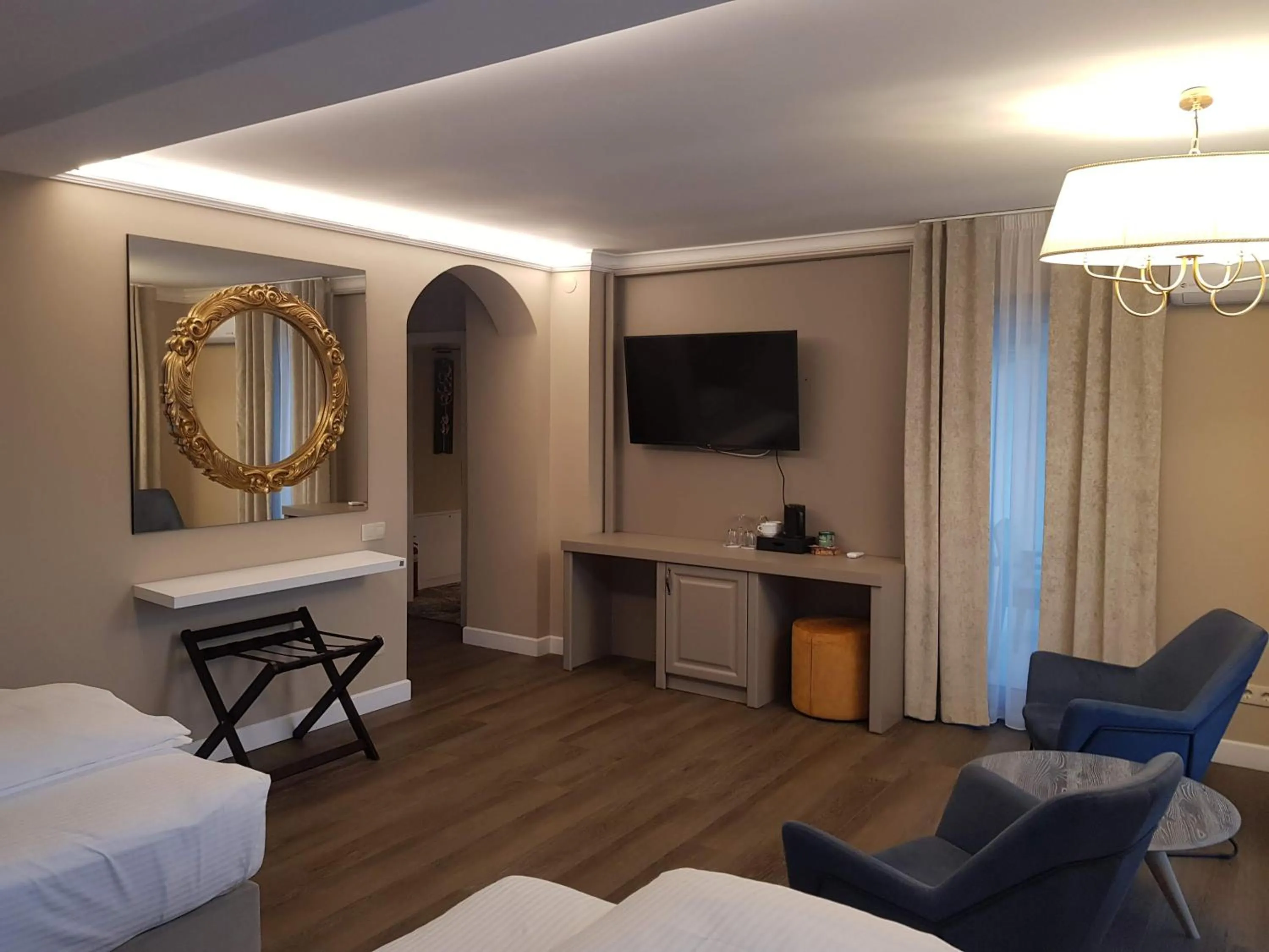 Photo of the whole room, Bed in Atlantic Boutique