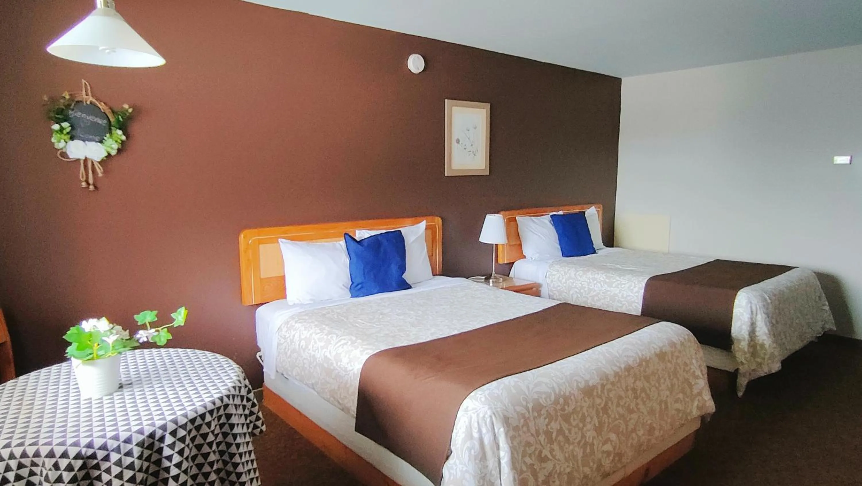 Bed in Motel Le Radisson de Val-David