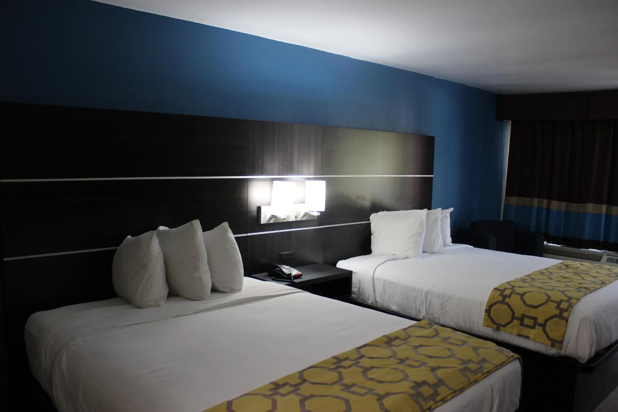 Bed in Baymont Inn & Suites