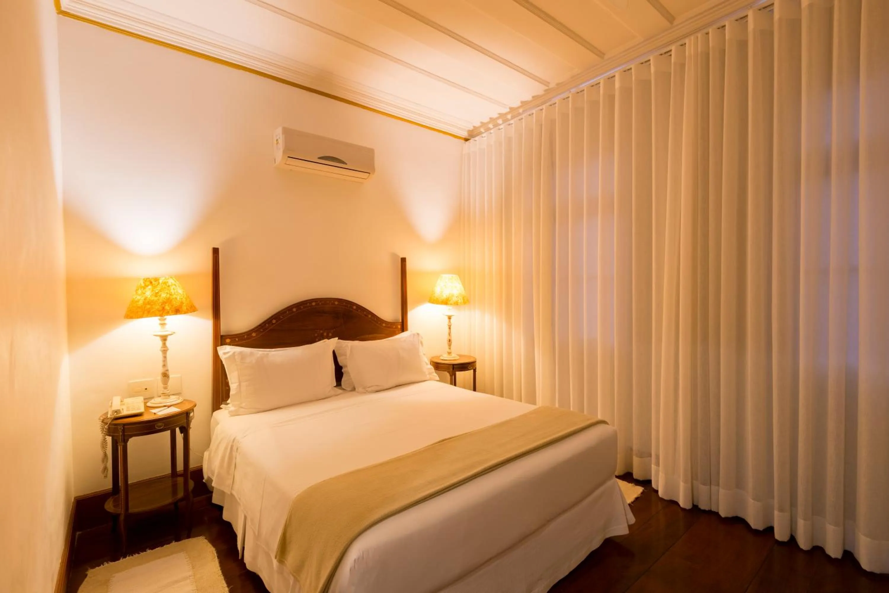 Bed in Hotel Solar do Rosário