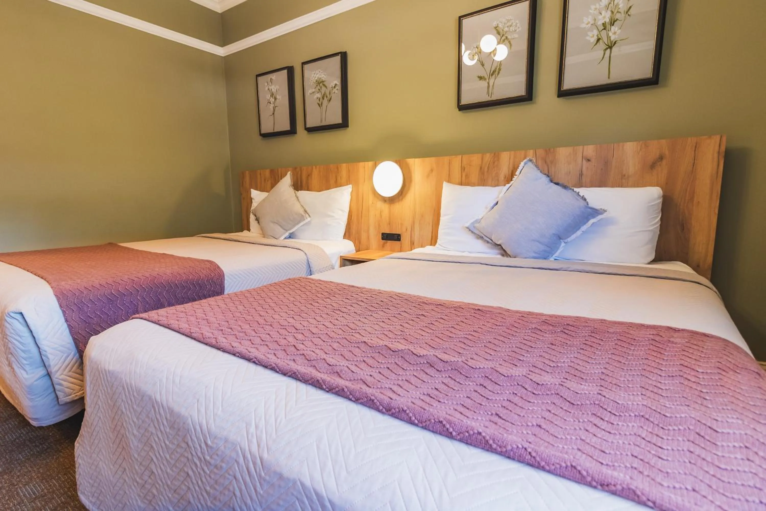 Bed in Historic Sonora Inn