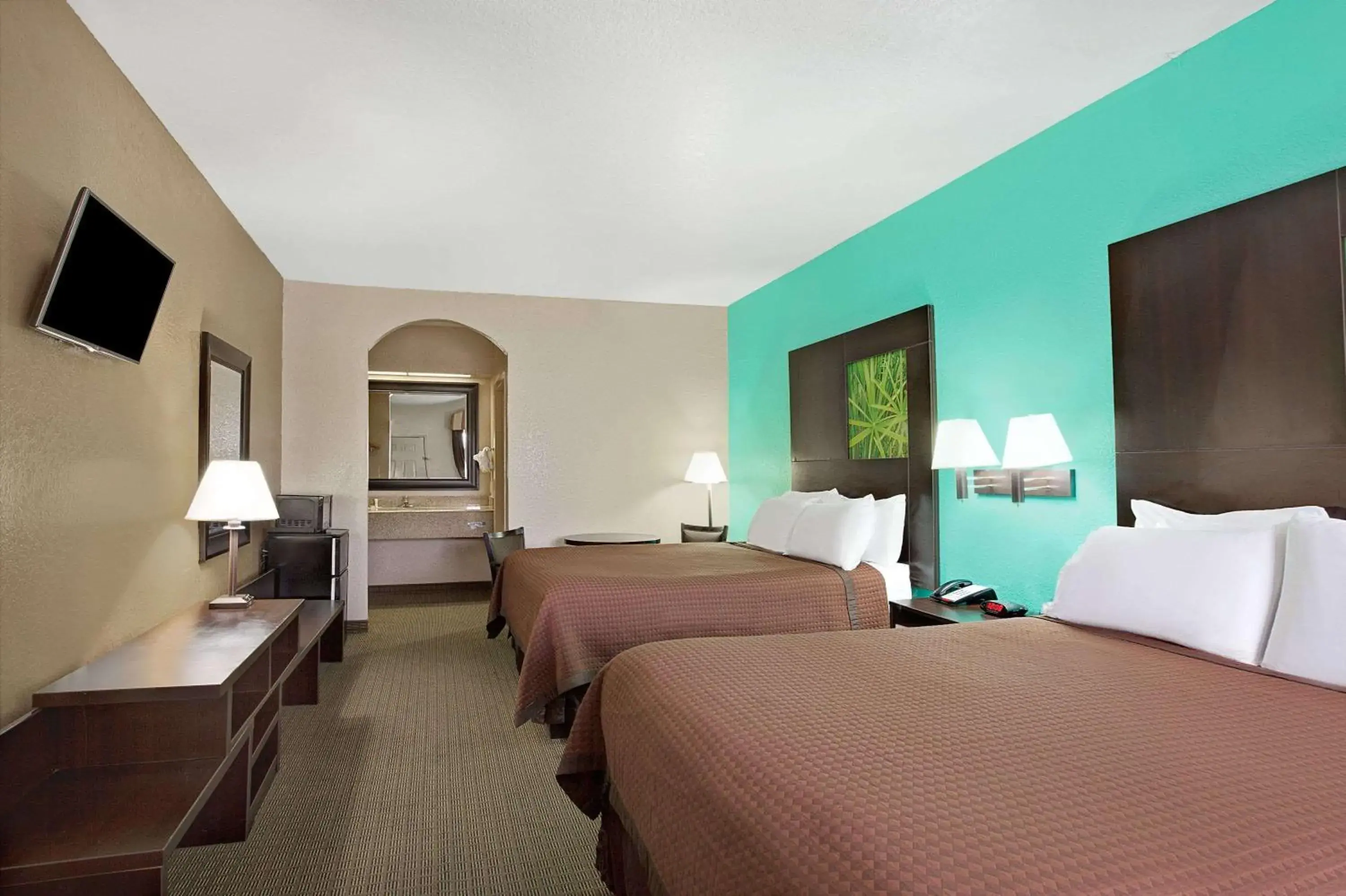 Photo of the whole room, Bed in Super 8 by Wyndham Galveston Photo of the whole room, Bed in Super 8 by Wyndham Galveston