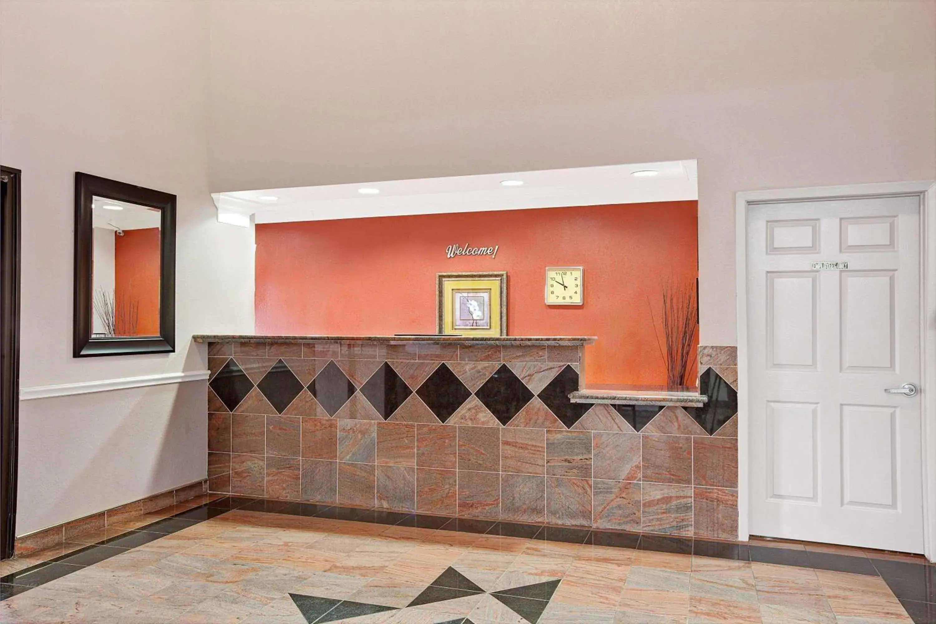 Lobby or reception in Super 8 by Wyndham Galveston Lobby or reception in Super 8 by Wyndham Galveston