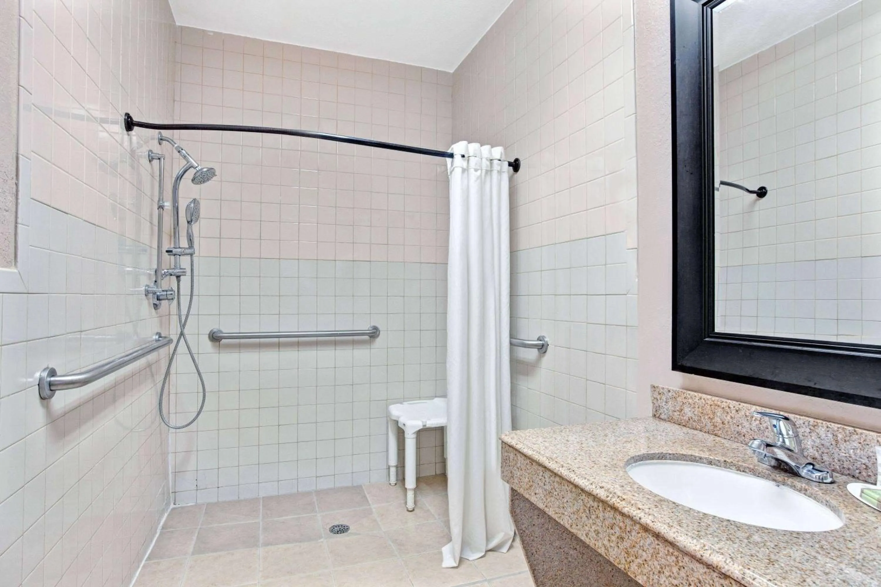 Photo of the whole room in Super 8 by Wyndham Galveston