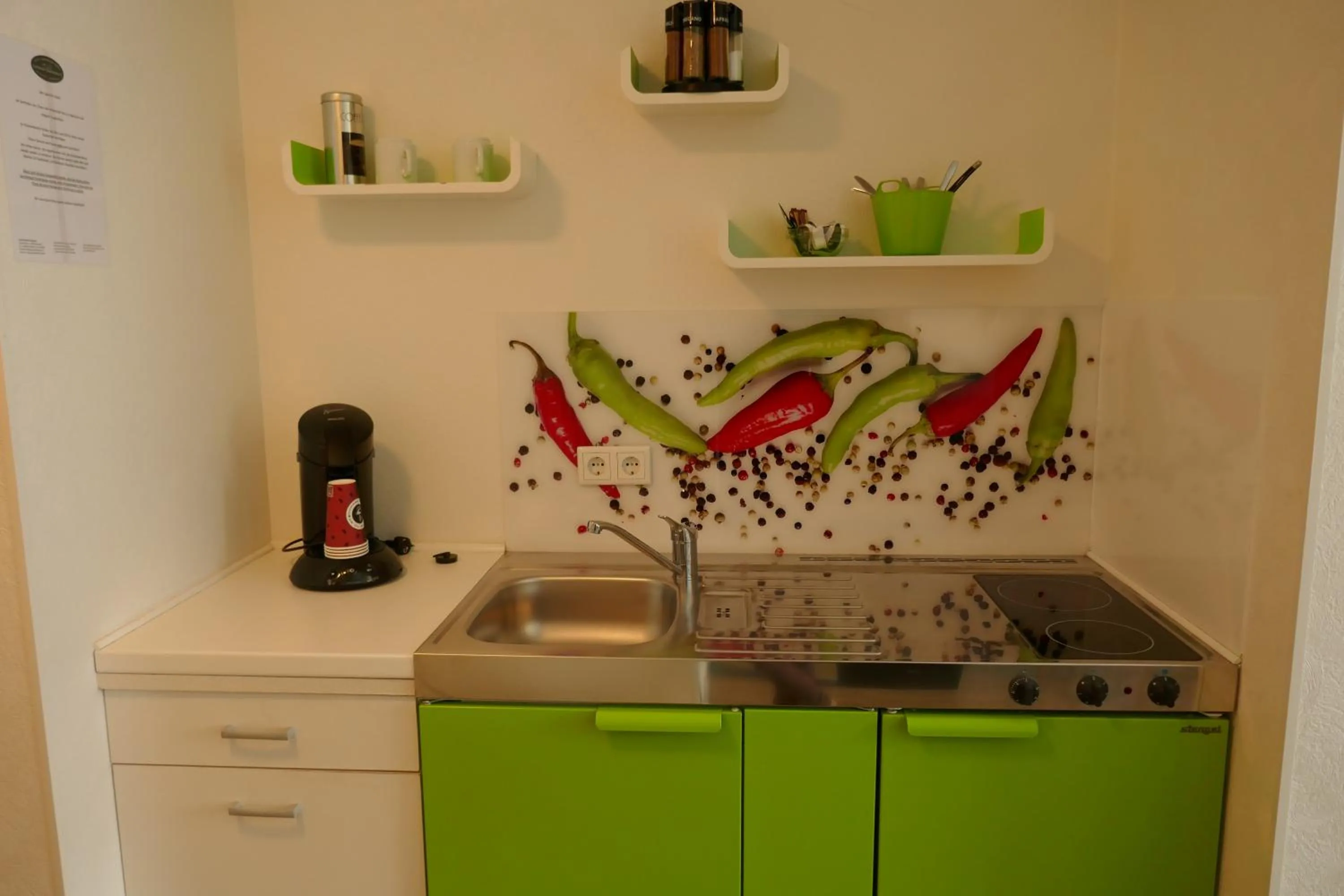 Kitchen or kitchenette in Appartmentanlage/Ferienhaus Handewitt
