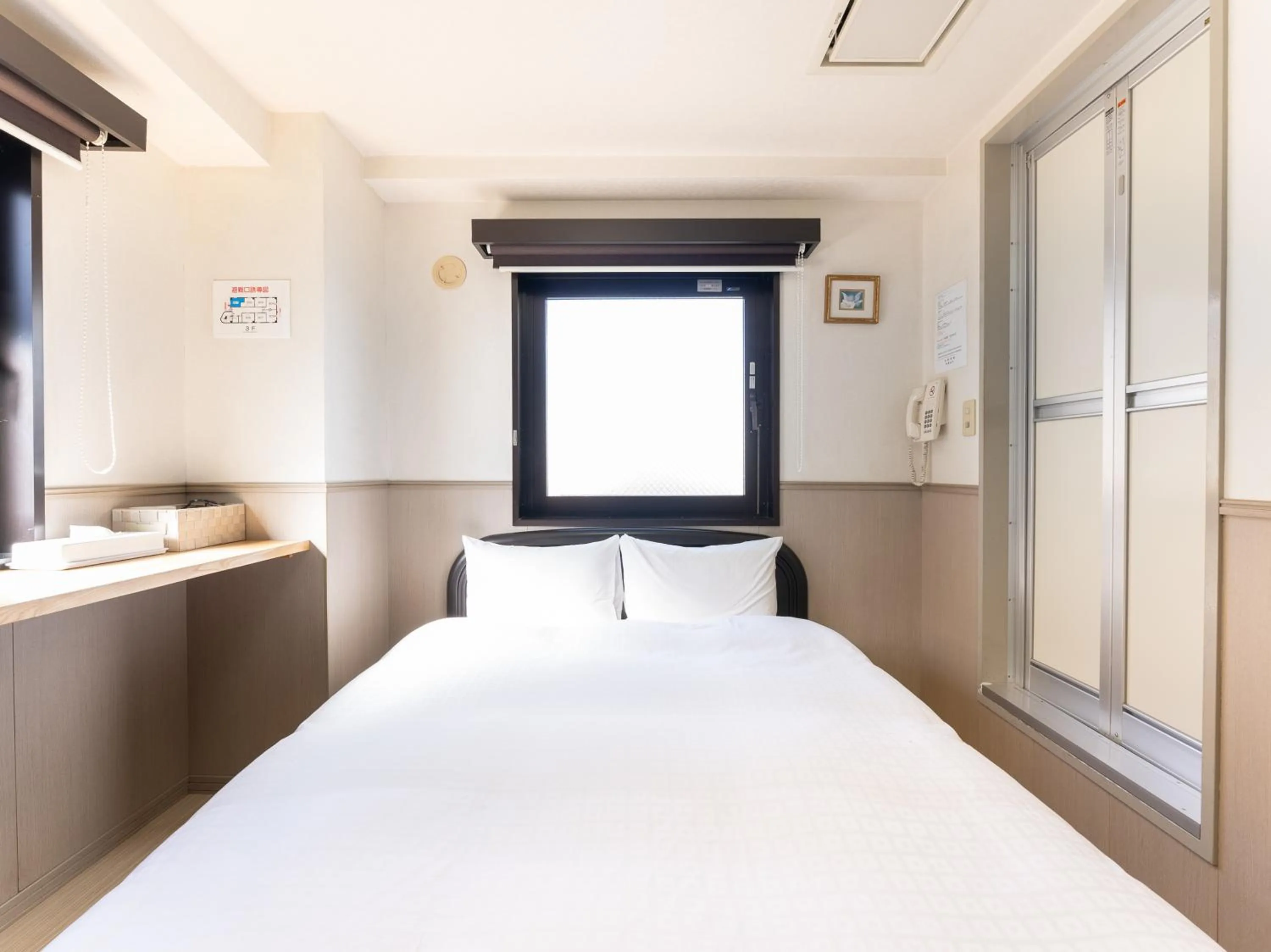 Bed in Chang Tee Hotel Ikebukuro