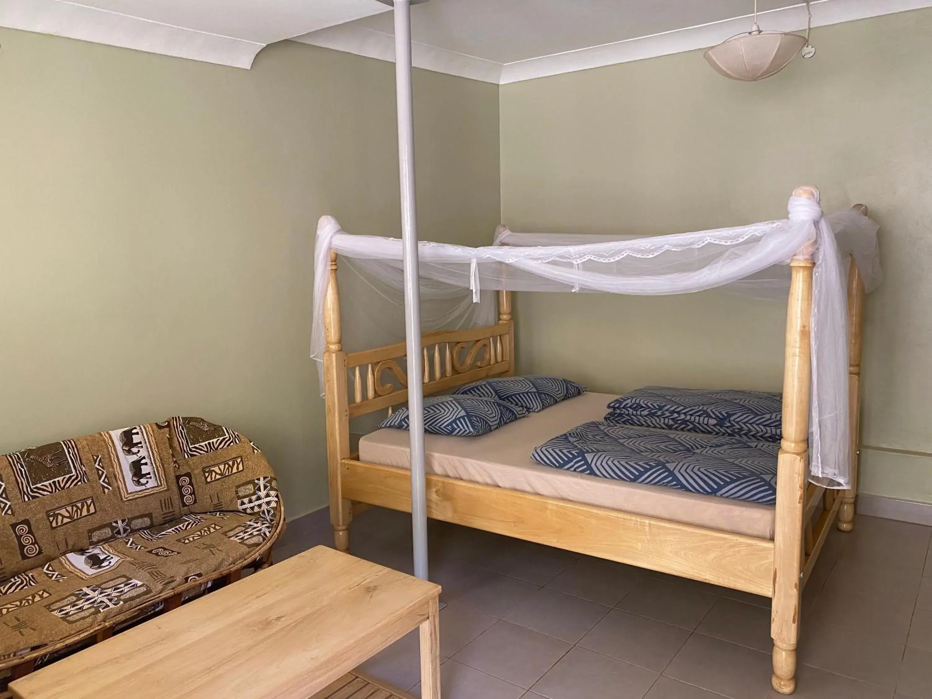 Queen Room with Shared Bathroom - single occupancy in Banda Lodge Queen Room with Shared Bathroom - single occupancy in Banda Lodge