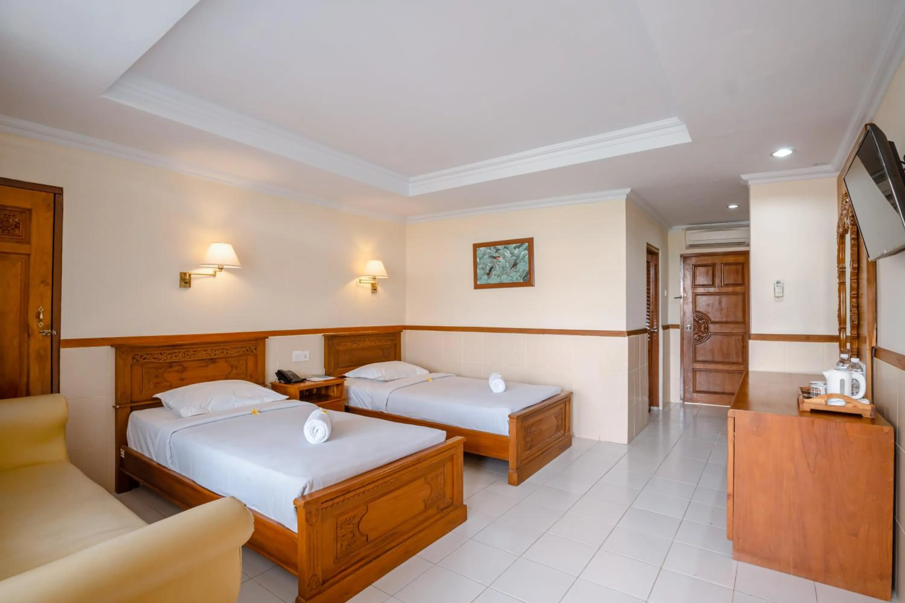 Bed in Palm Beach Hotel Bali