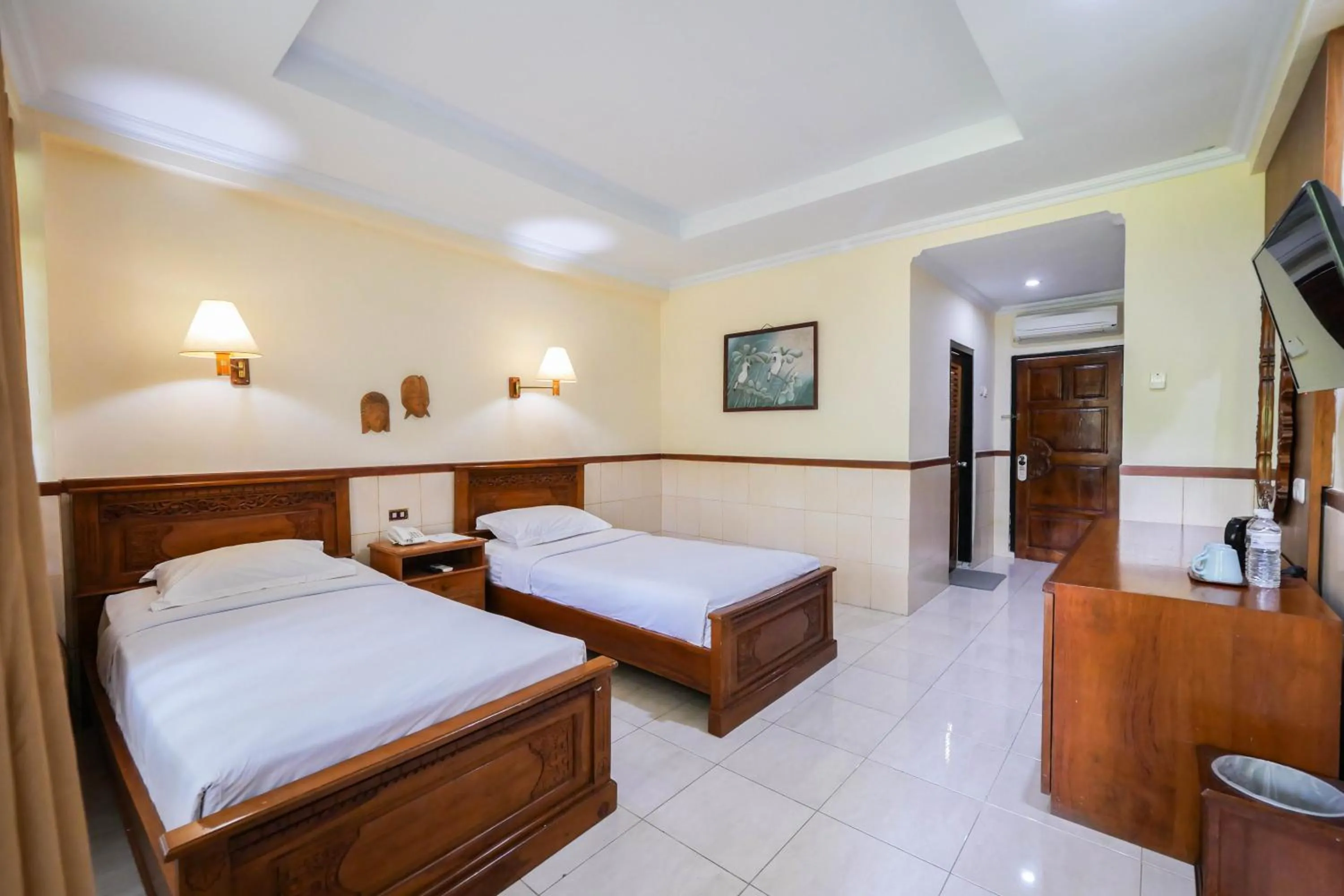 Bed in Palm Beach Hotel Bali