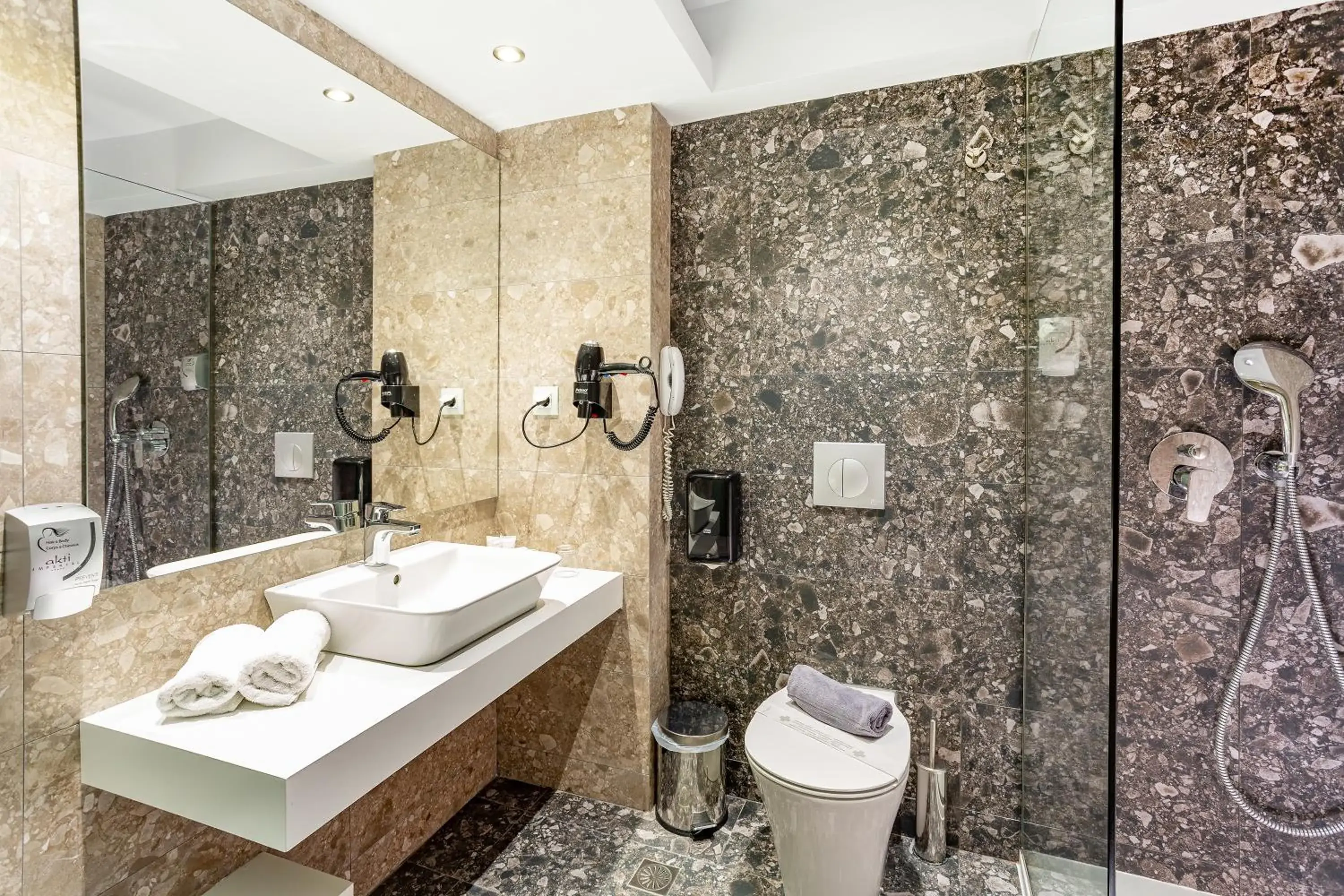 Bathroom in Akti Imperial Deluxe Resort & Spa Dolce by Wyndham Bathroom in Akti Imperial Deluxe Resort & Spa Dolce by Wyndham