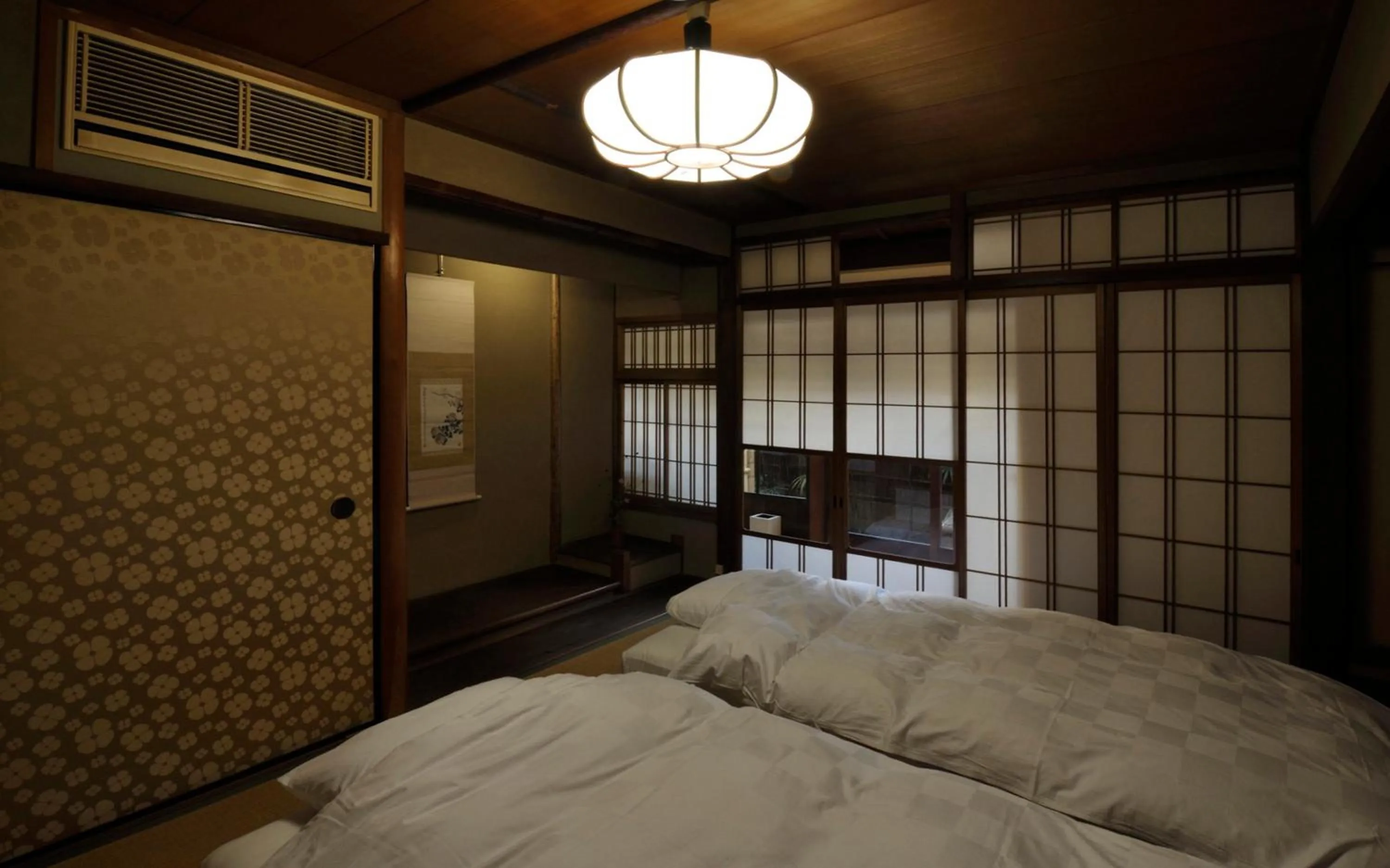 Photo of the whole room, Bed in IZUYASU Traditional Kyoto Inn serving Kyoto cuisine
