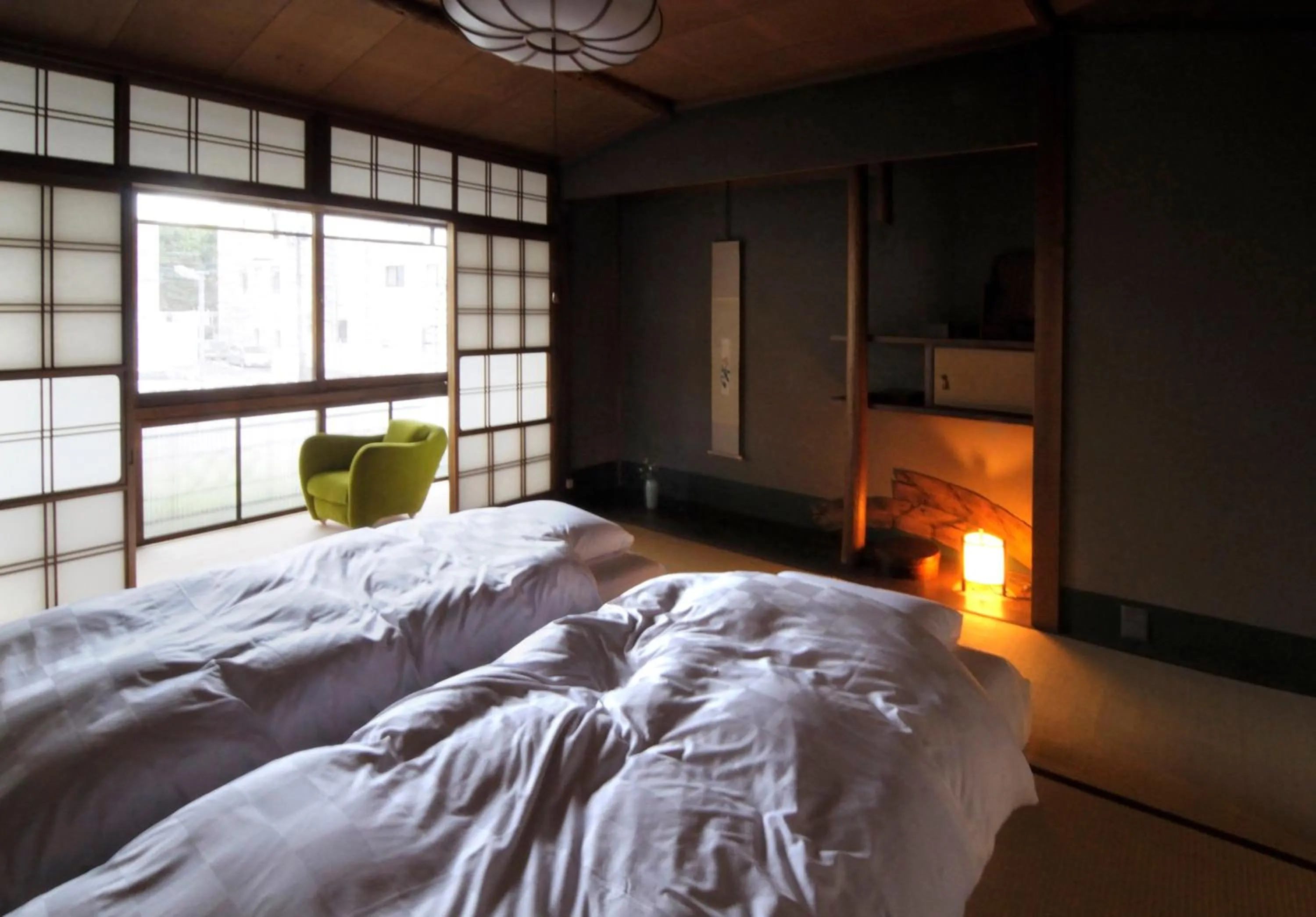 Photo of the whole room, Bed in IZUYASU Traditional Kyoto Inn serving Kyoto cuisine
