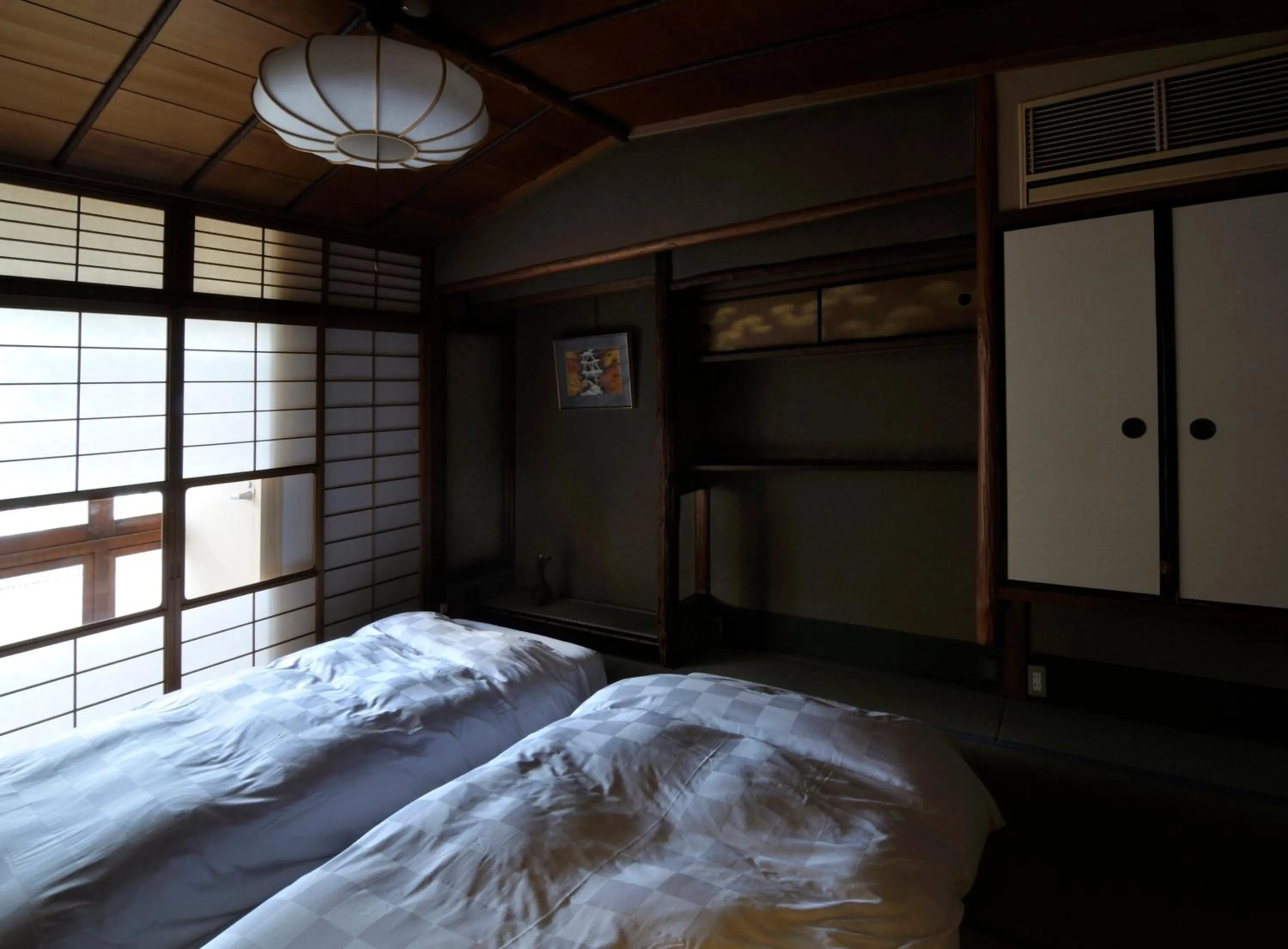 Bed in IZUYASU Traditional Kyoto Inn serving Kyoto cuisine