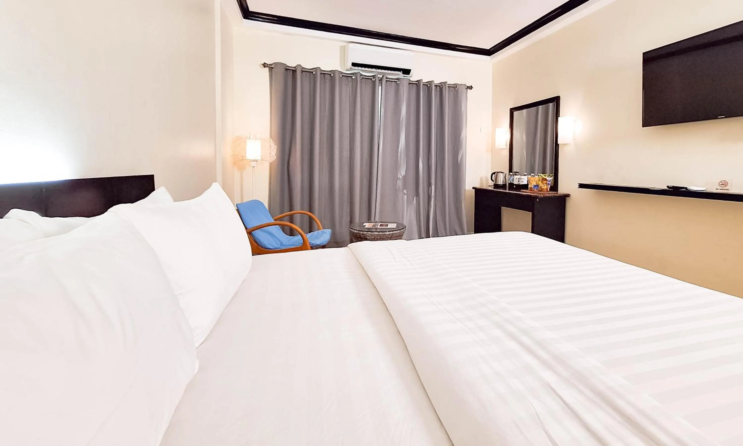 Bed in Boracay Ocean Club Beach Resort