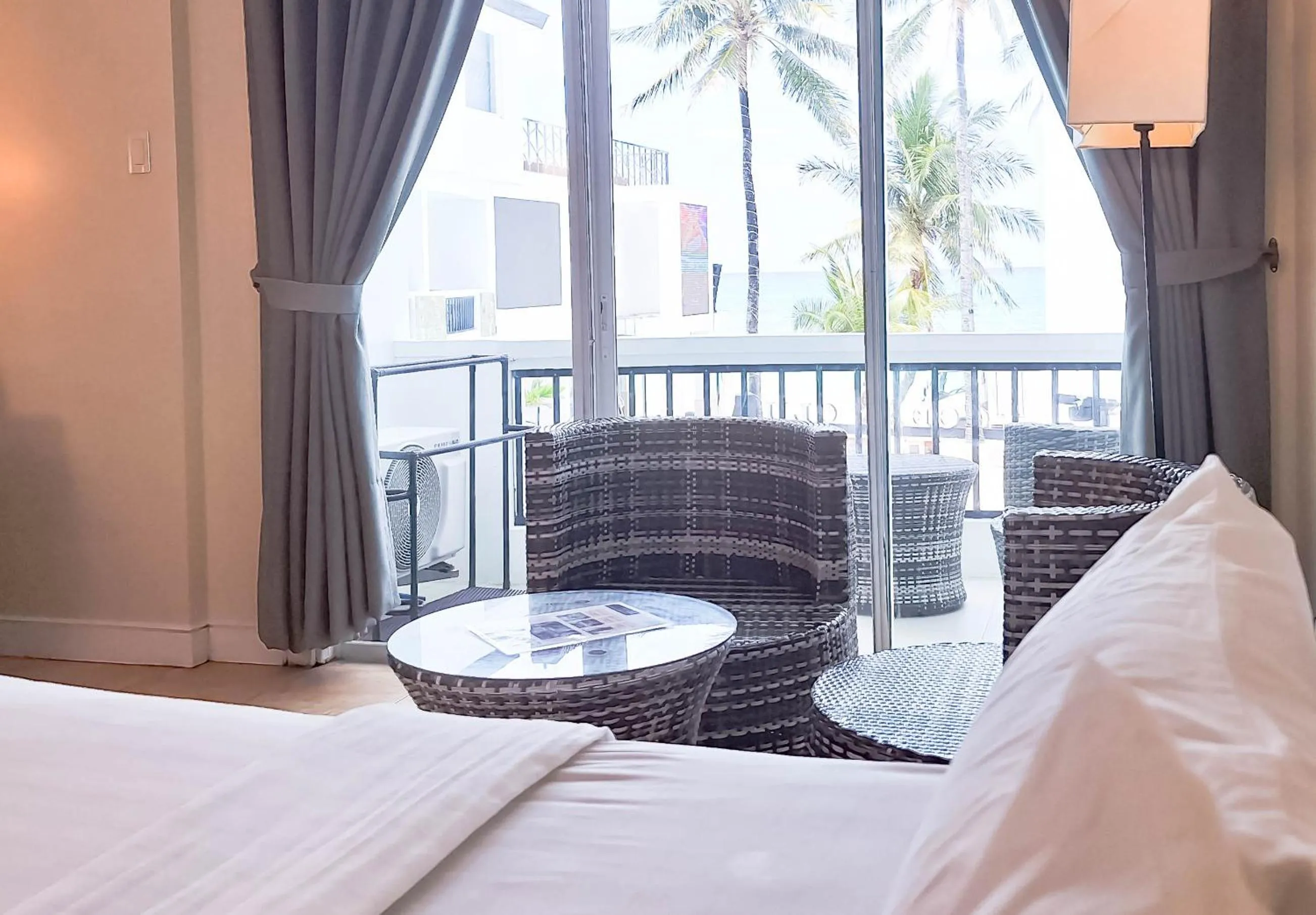 Balcony/Terrace, Bed in Boracay Ocean Club Beach Resort