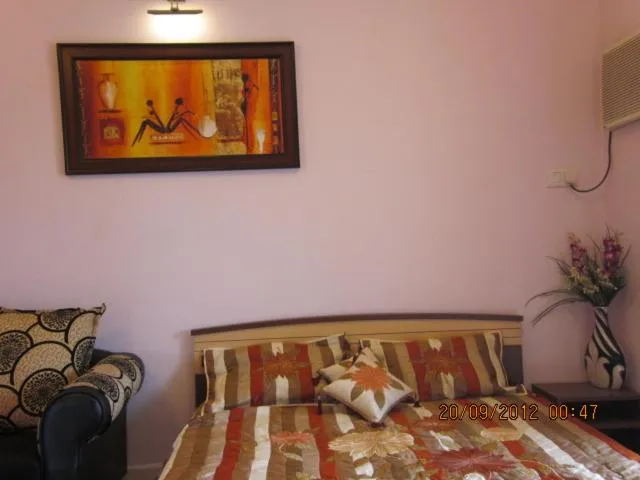 Bed in AF-6 Candolim with shared pool