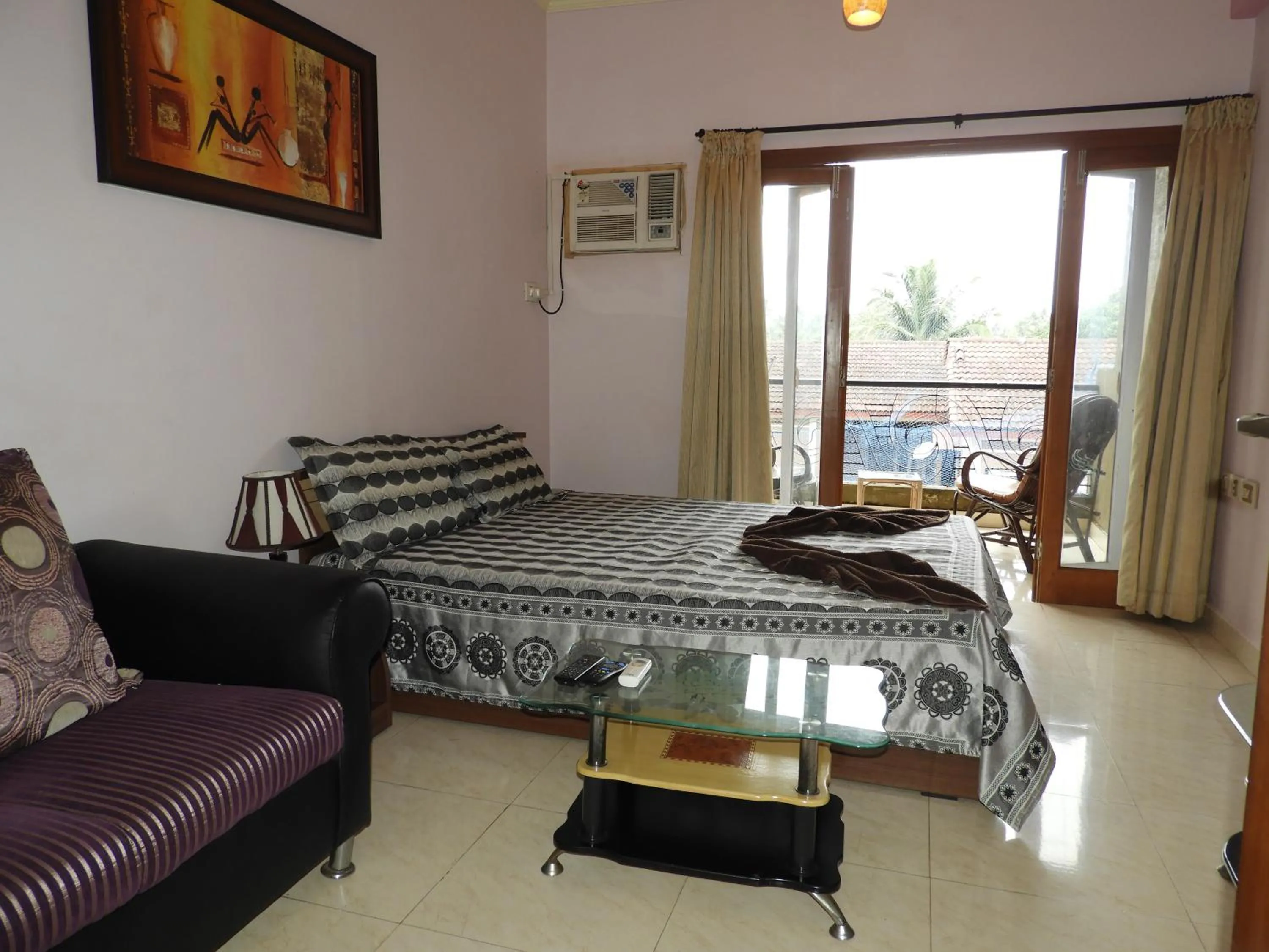 Bed in AF-6 Candolim with shared pool