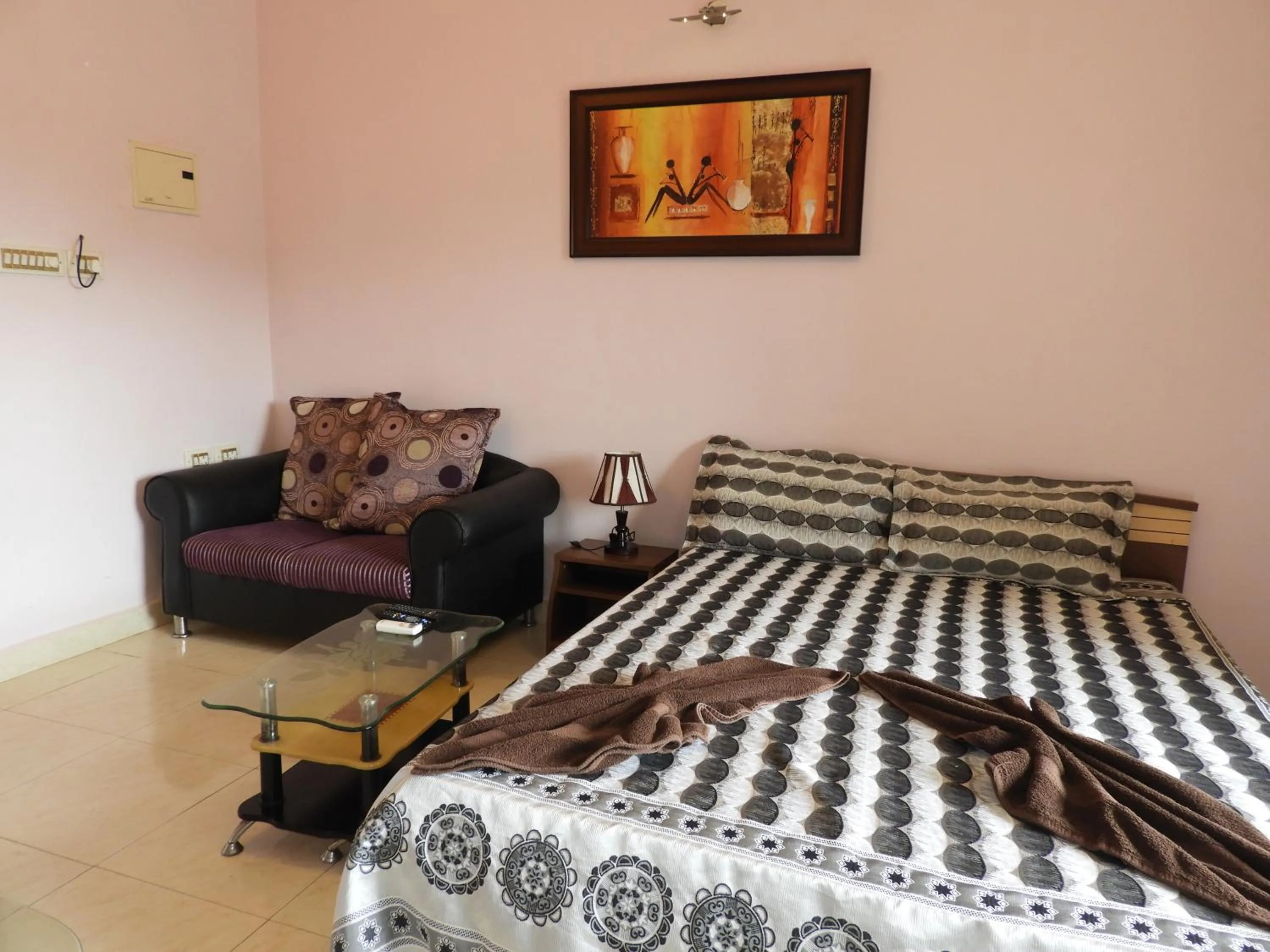 Bed in AF-6 Candolim with shared pool