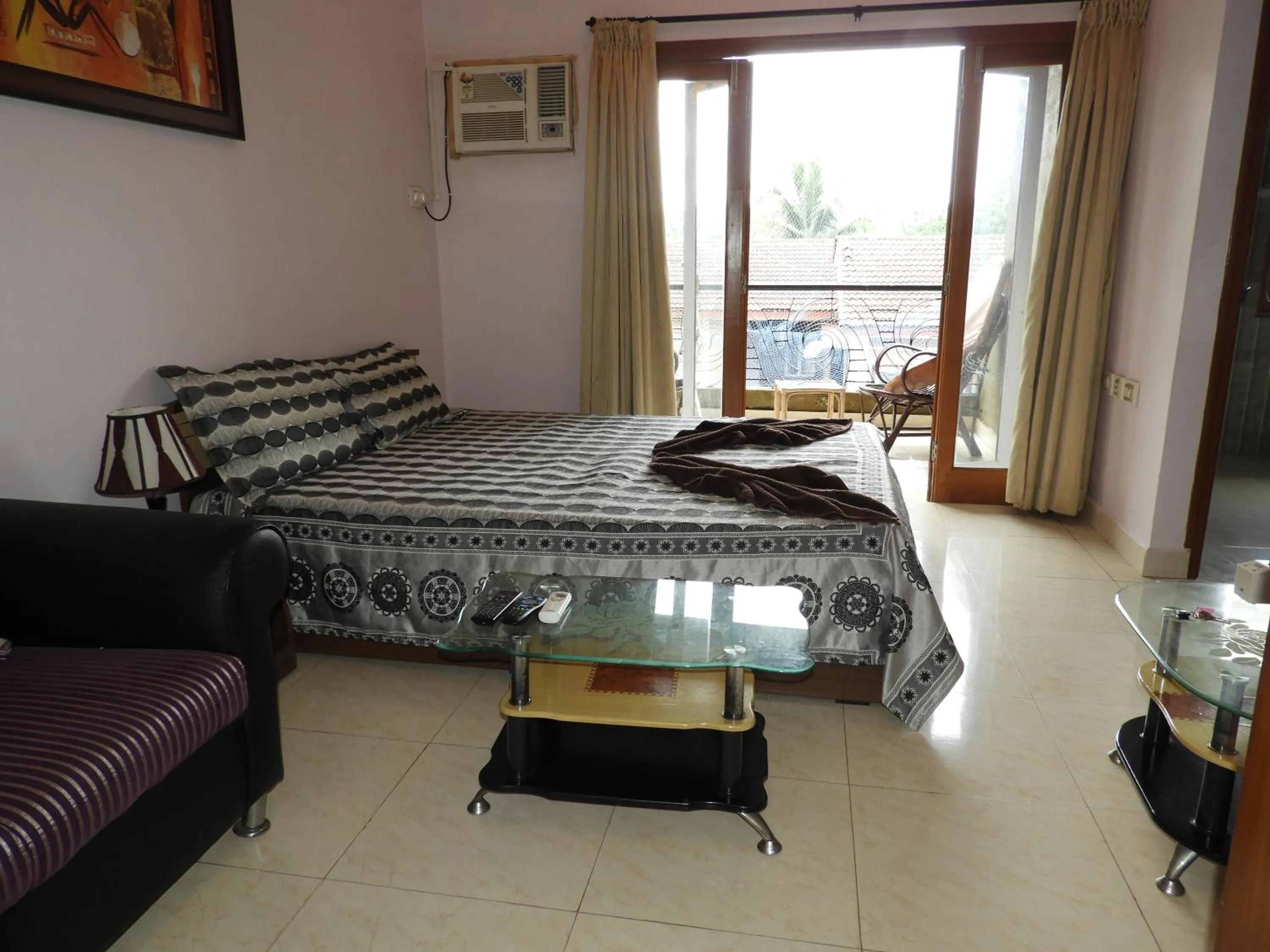 Bed in AF-6 Candolim with shared pool