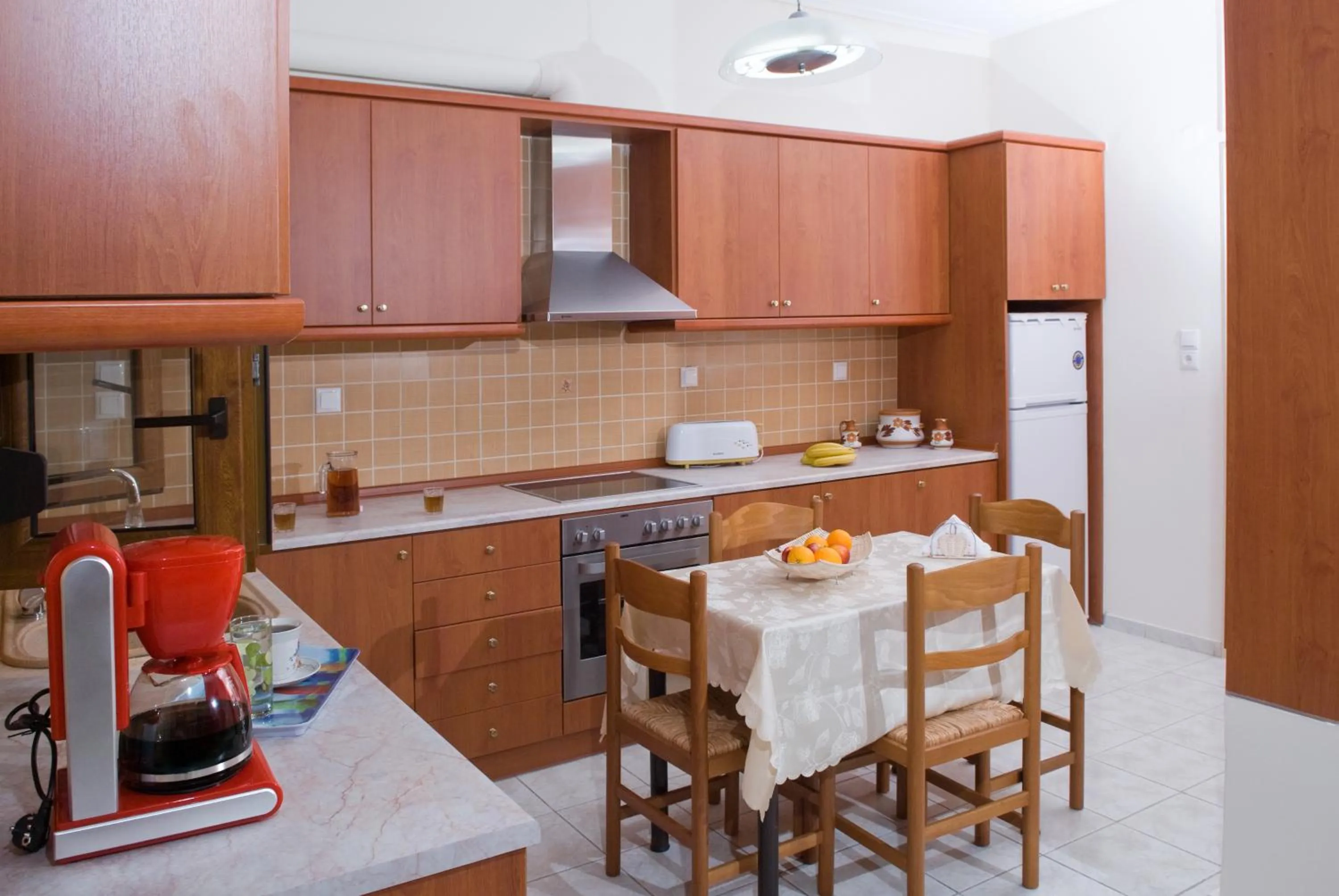 Kitchen or kitchenette in Christina Apartments