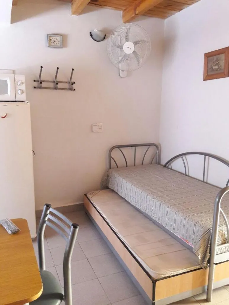 Living room, Bed in Amaneceres Las Grutas