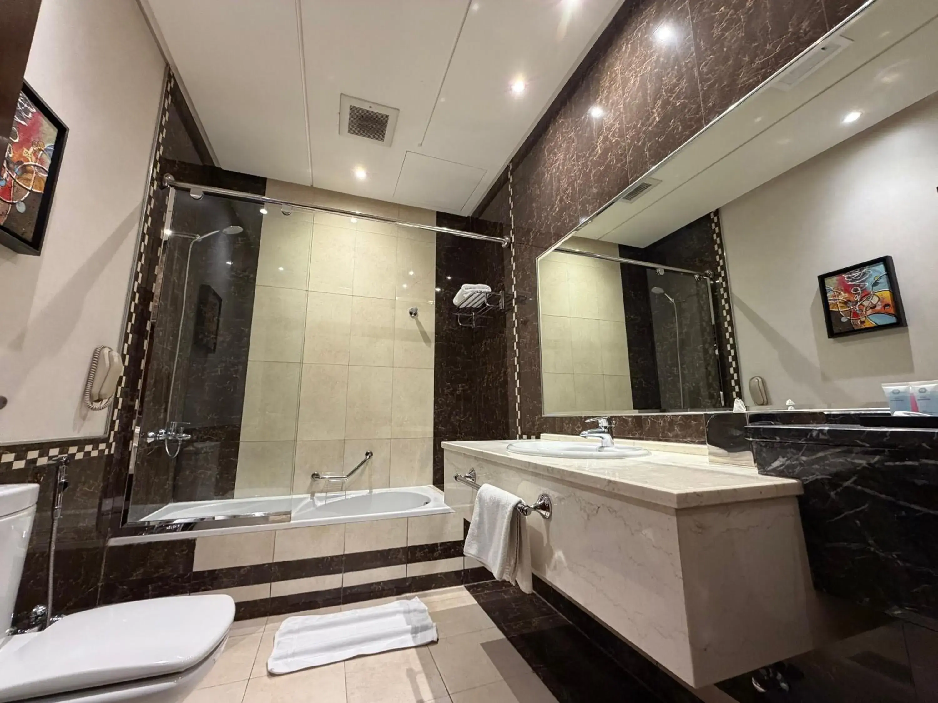 Bathroom in Sunday Signature Riyadh Formerly Qaser Al Hamra by Warwick Bathroom in Sunday Signature Riyadh Formerly Qaser Al Hamra by Warwick