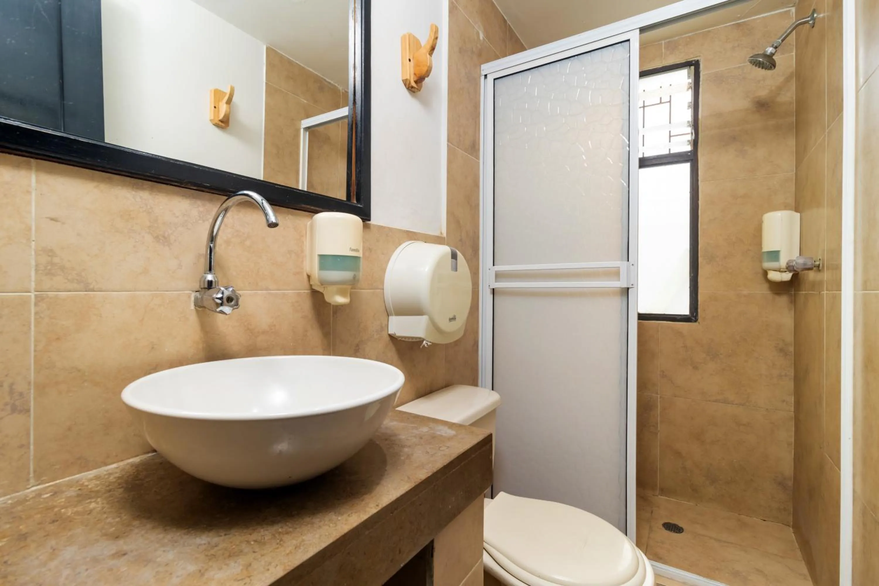 Bathroom in Hotel Sansiraka Suites By GEH Suites