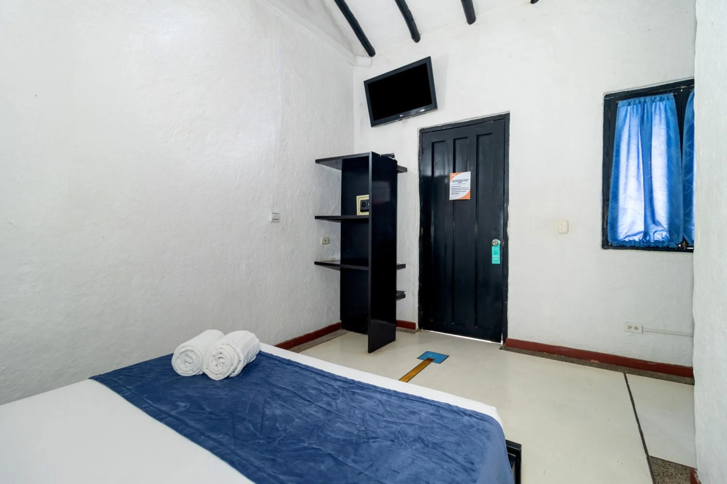 Bed in Hotel Sansiraka Suites By GEH Suites