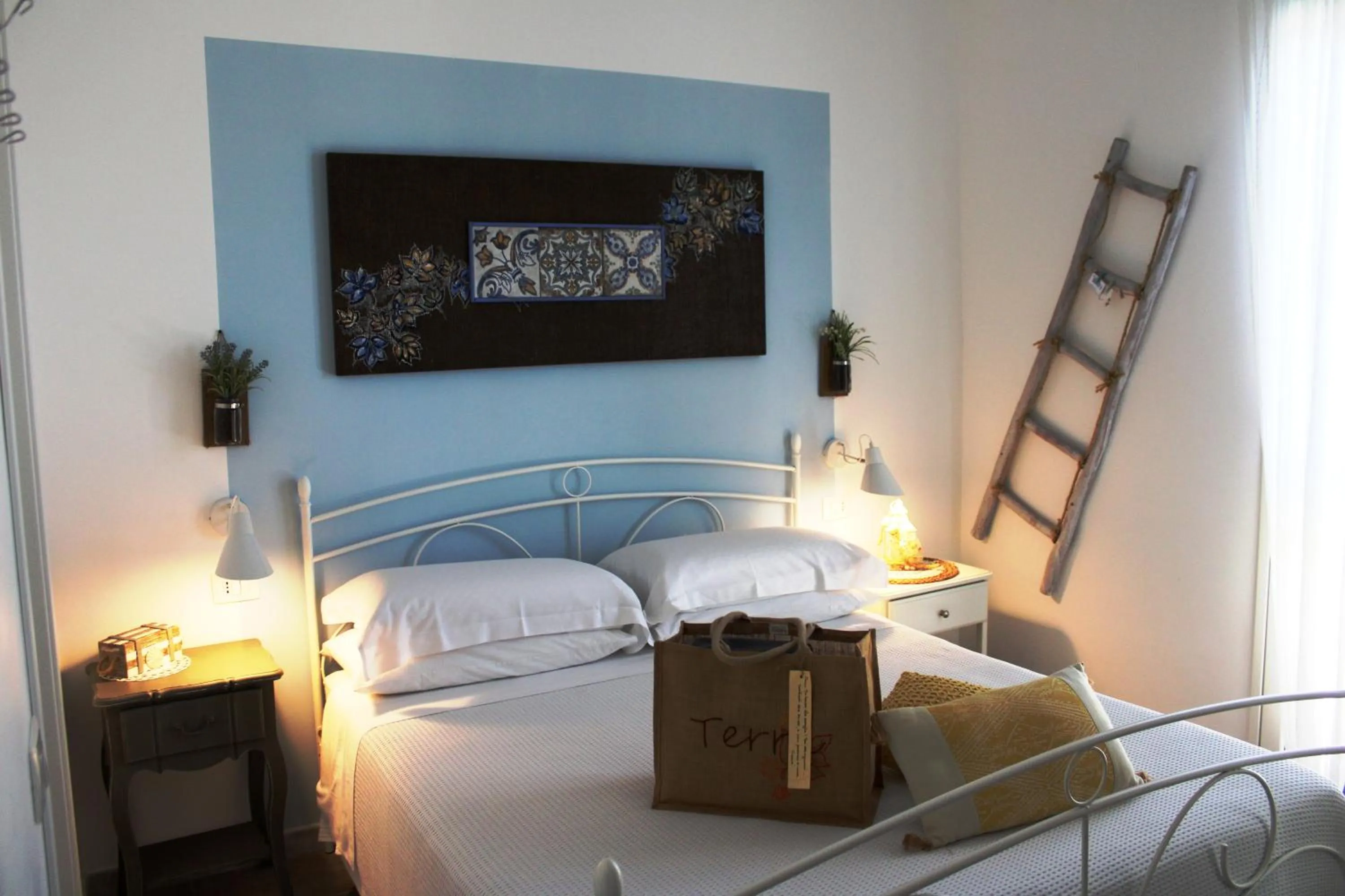 Bed in B&B Casa del Faro SanVallero Adults Only