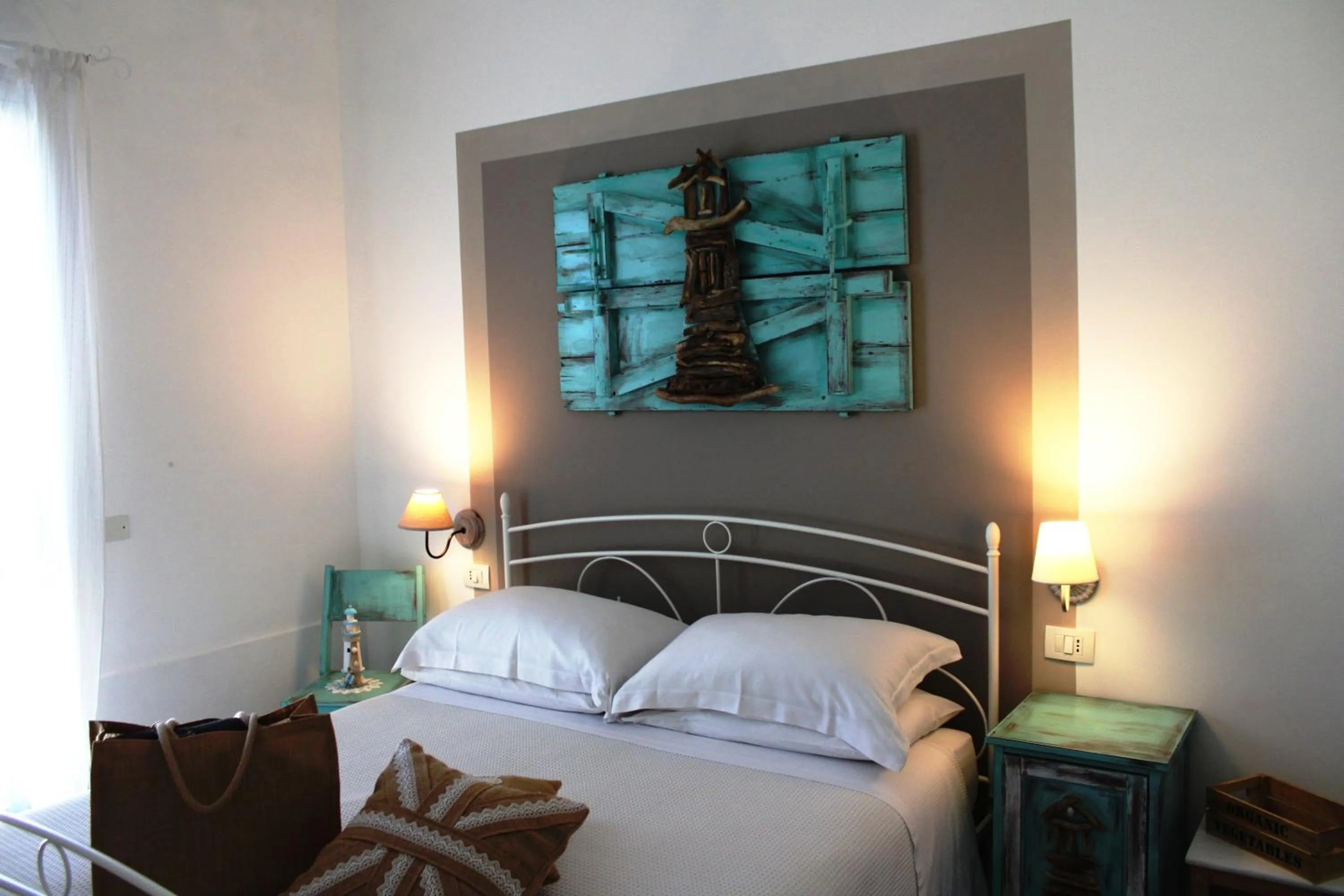 Bed in B&B Casa del Faro SanVallero Adults Only