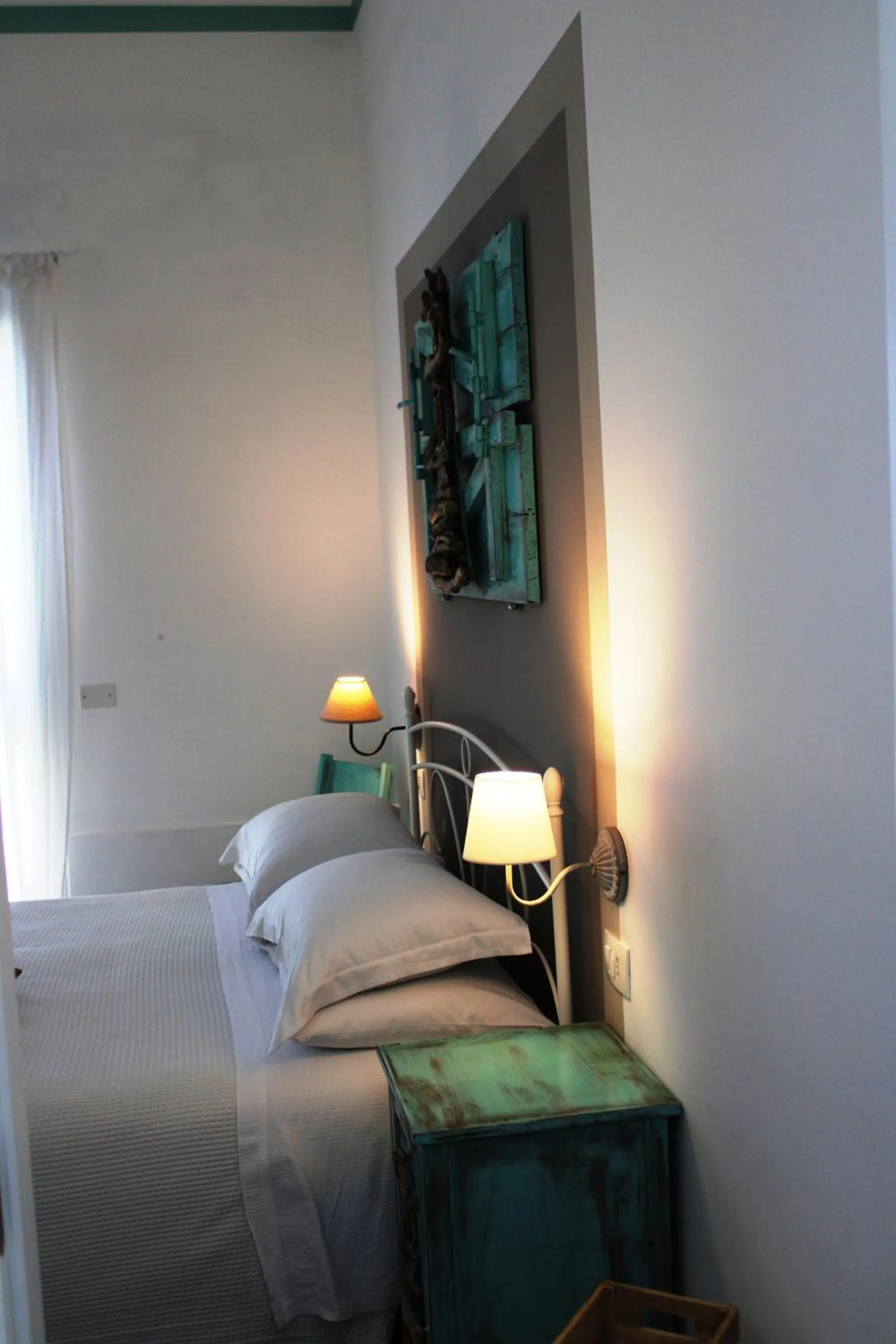 Bed in B&B Casa del Faro SanVallero Adults Only