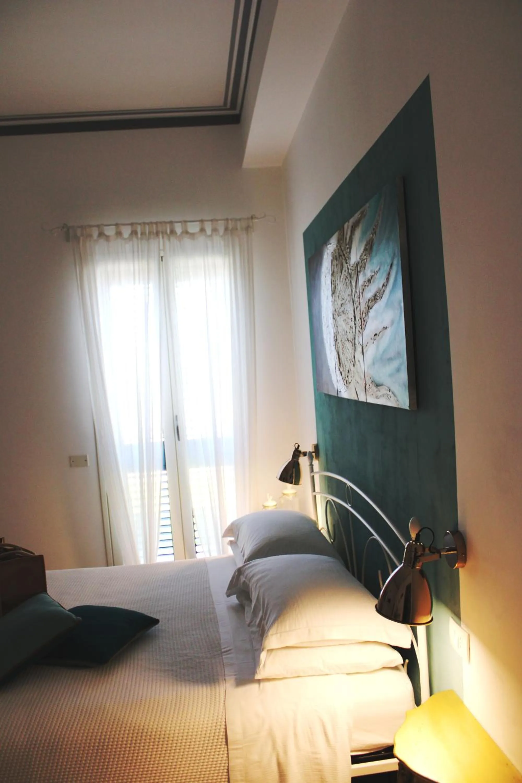 Bed in B&B Casa del Faro SanVallero Adults Only