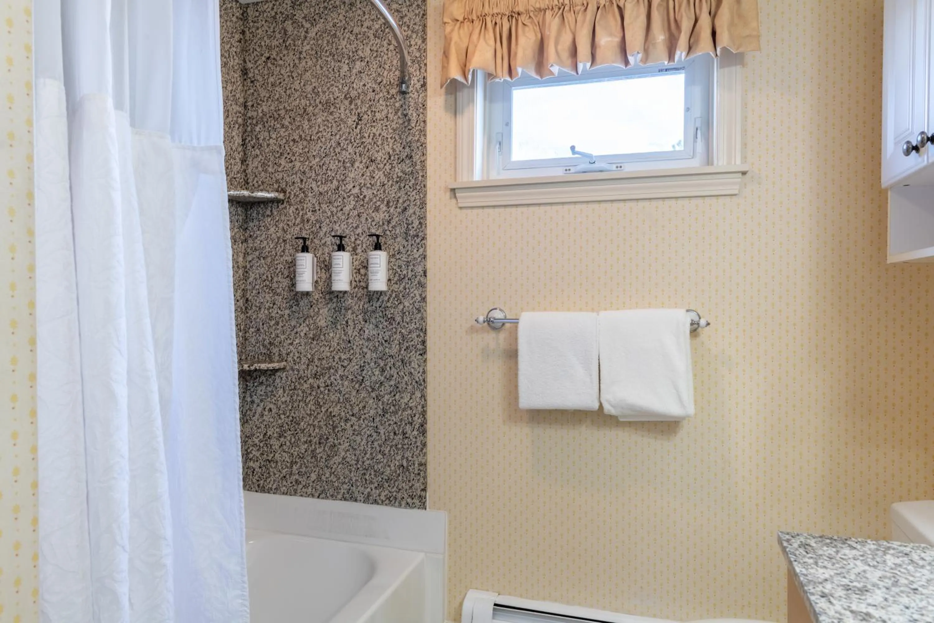 Bathroom in Port Inn and Suites Portsmouth, an Ascend Collection Hotel