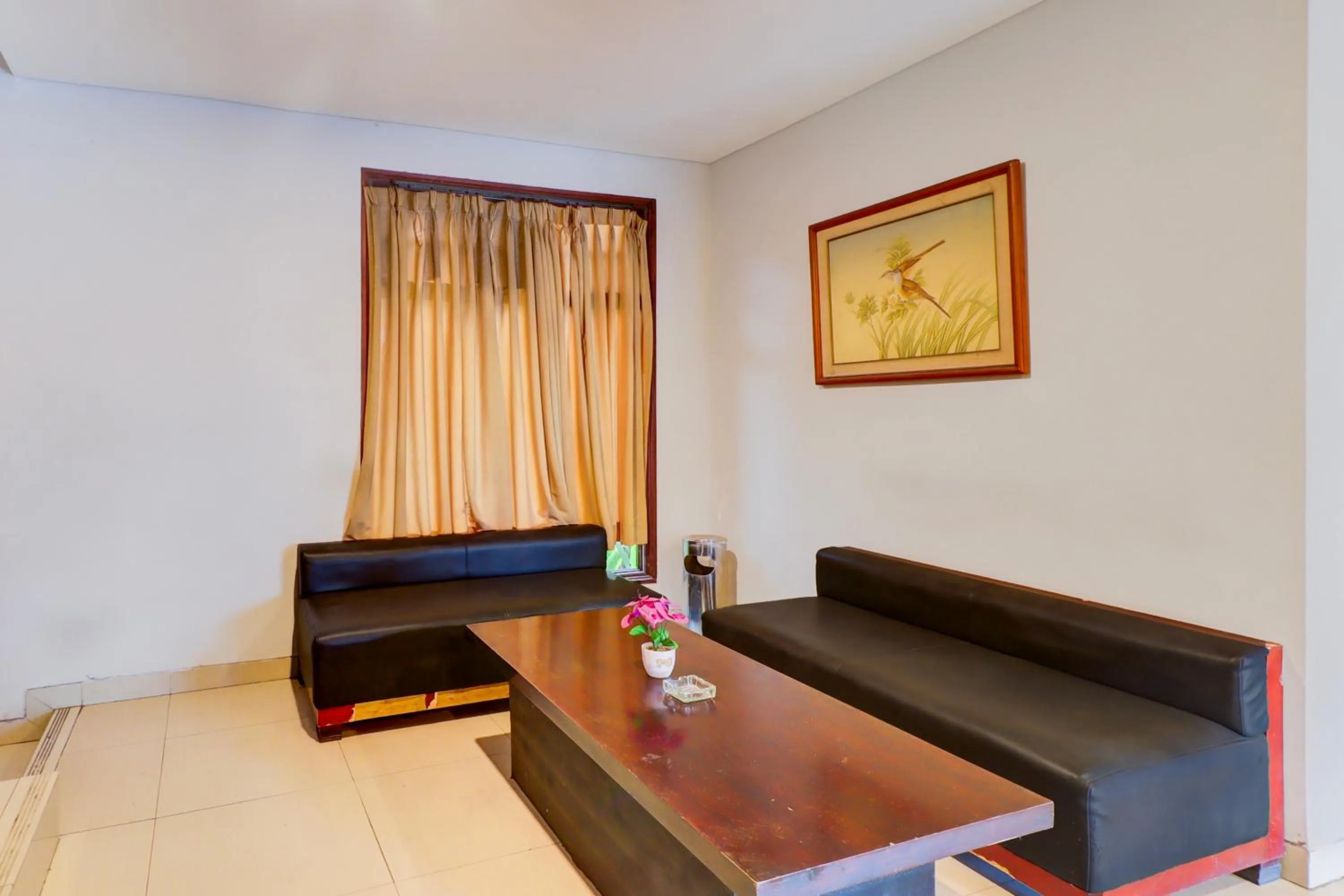 Seating area in Collection O Bali near Sanur Beach formerly Akarsa Transit