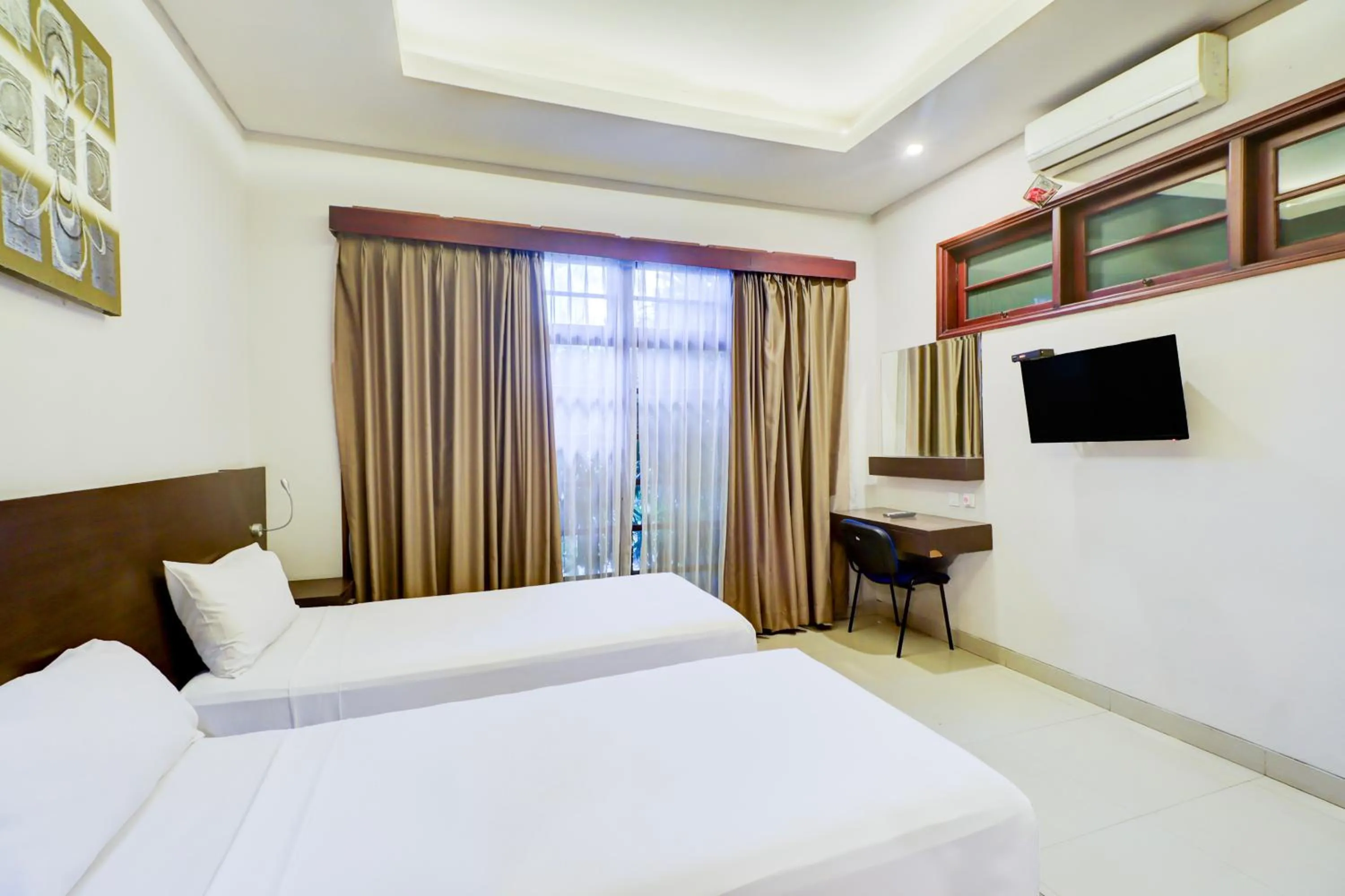 Bed in Collection O Bali near Sanur Beach formerly Akarsa Transit