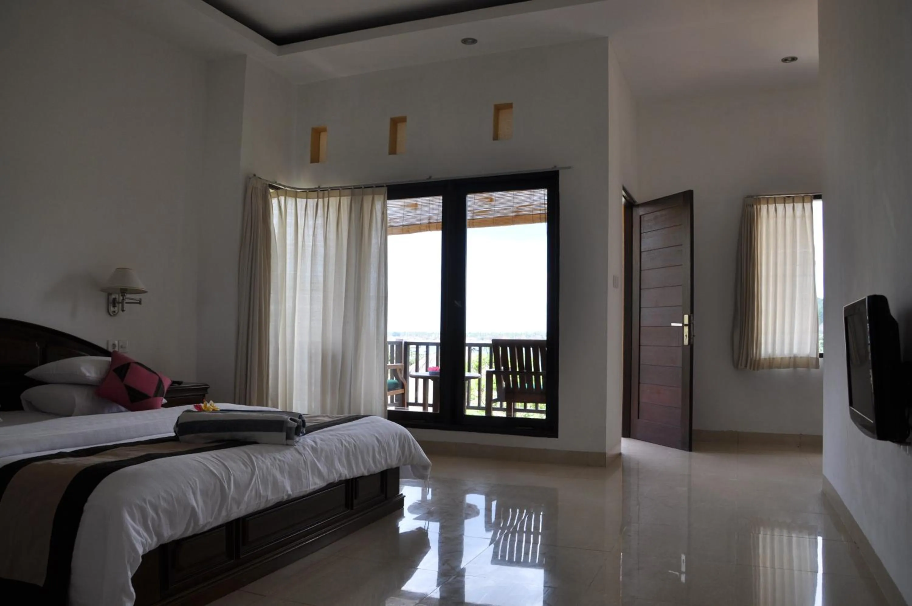 Bed in Tamarind Beach Bungalow
