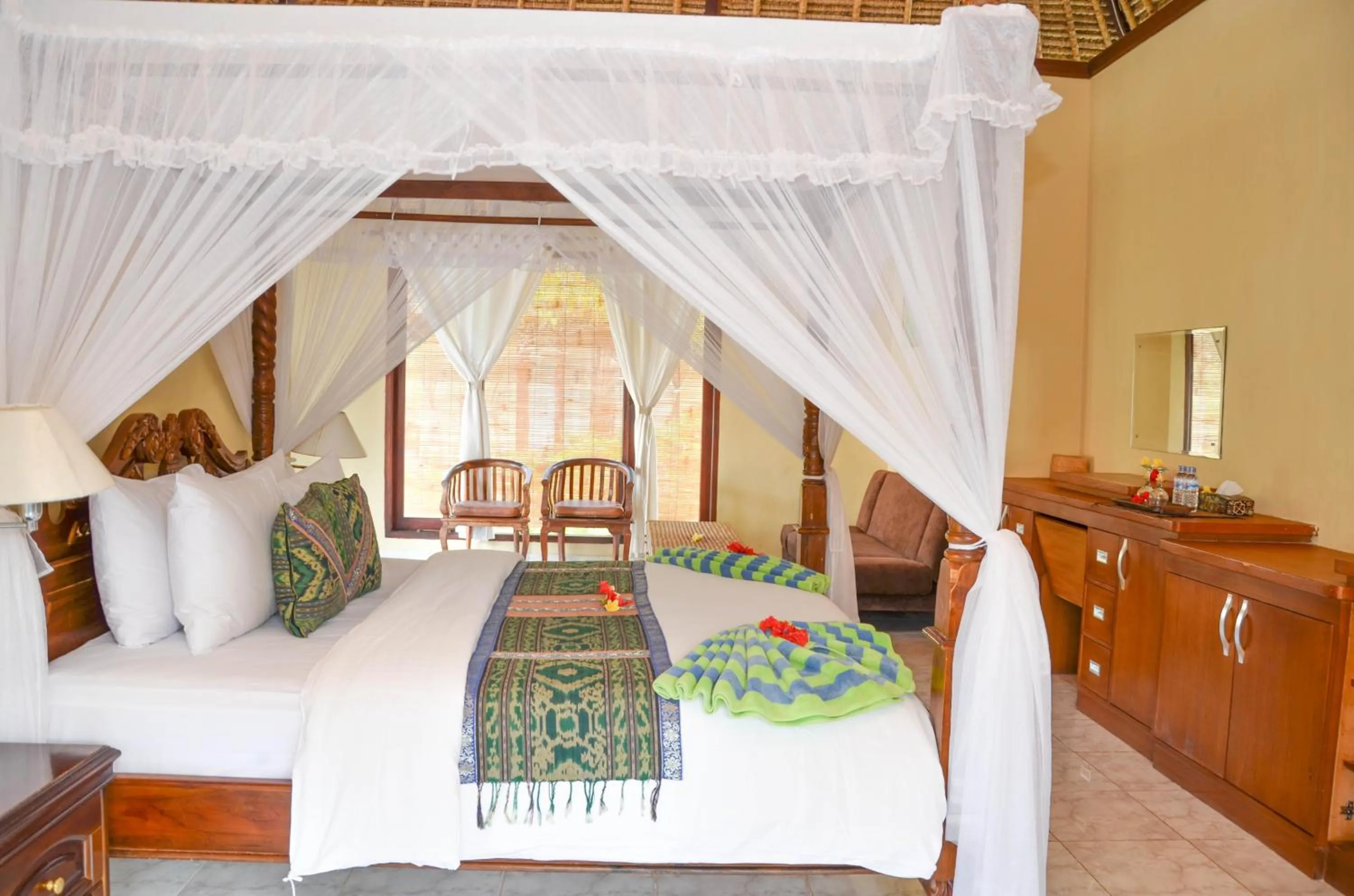 Bed in Tamarind Beach Bungalow