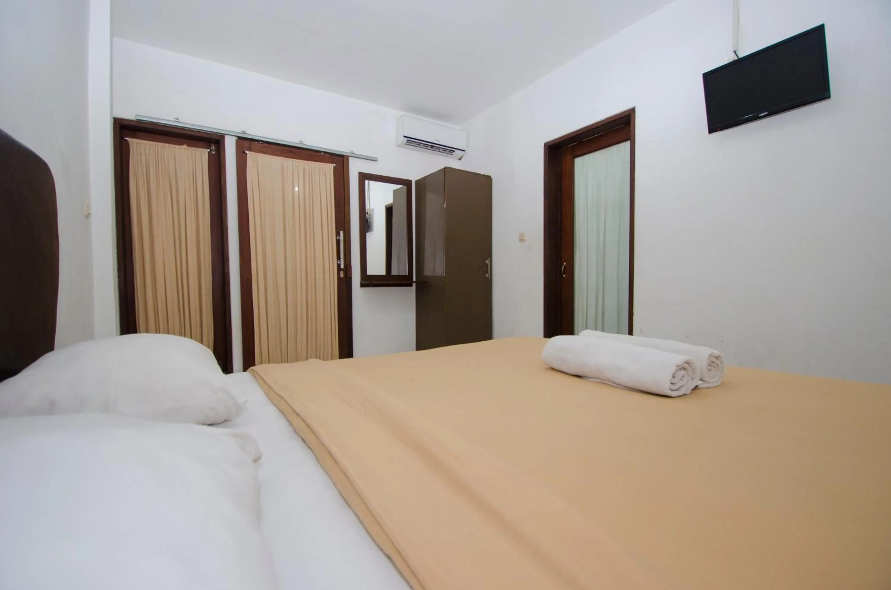 Bedroom, Bed in Taman Sari Cottages