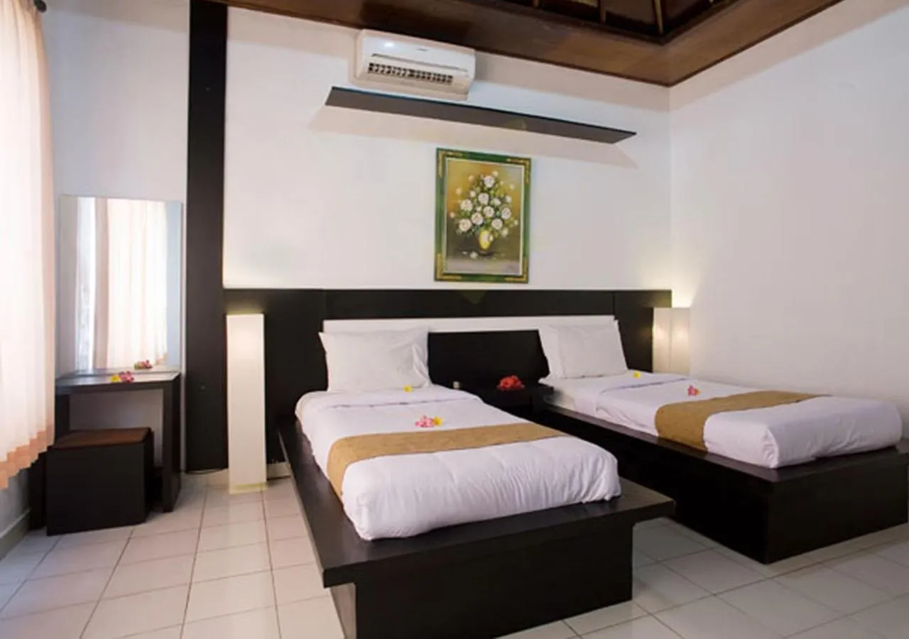 Bedroom, Bed in Taman Sari Cottages