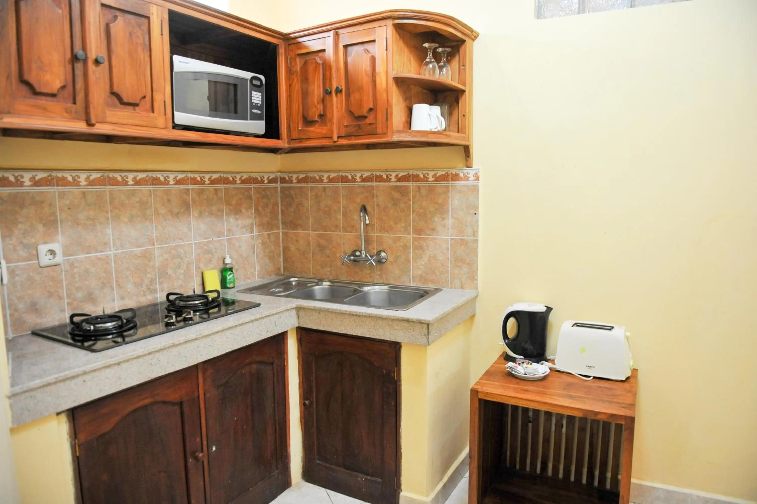 Kitchen or kitchenette in Bali Palms Resort