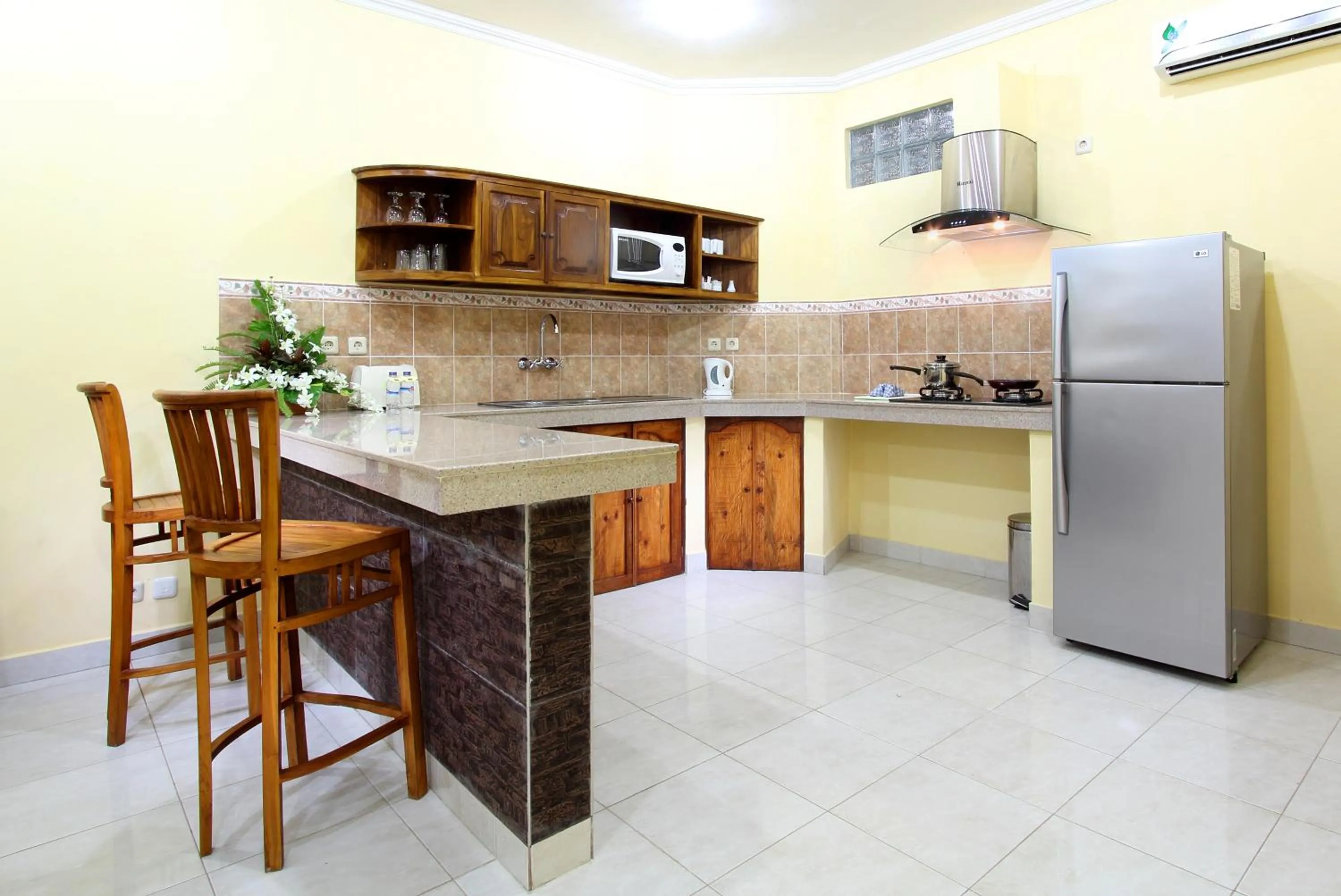 Kitchen or kitchenette in Bali Palms Resort