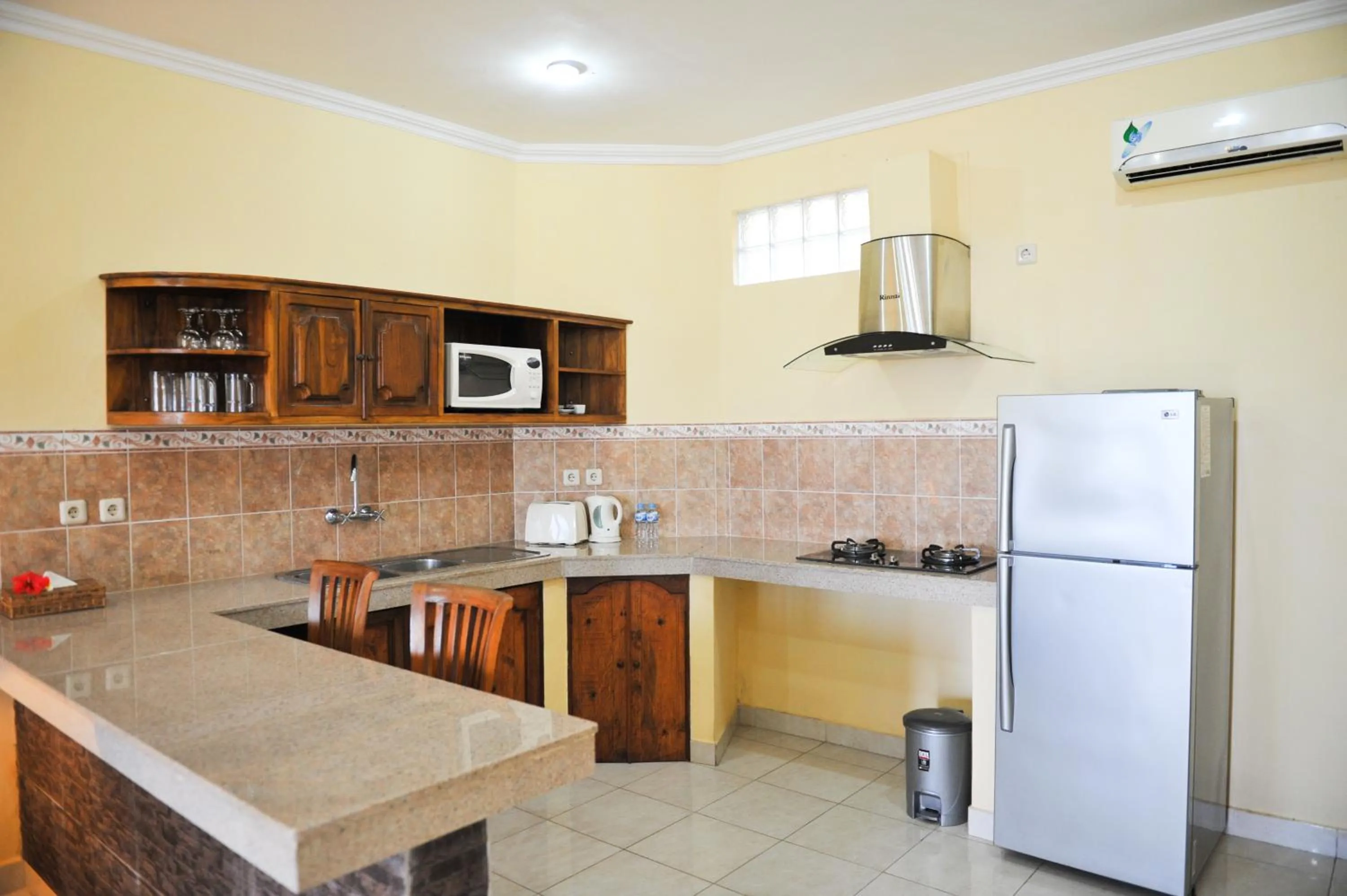 Kitchen or kitchenette in Bali Palms Resort