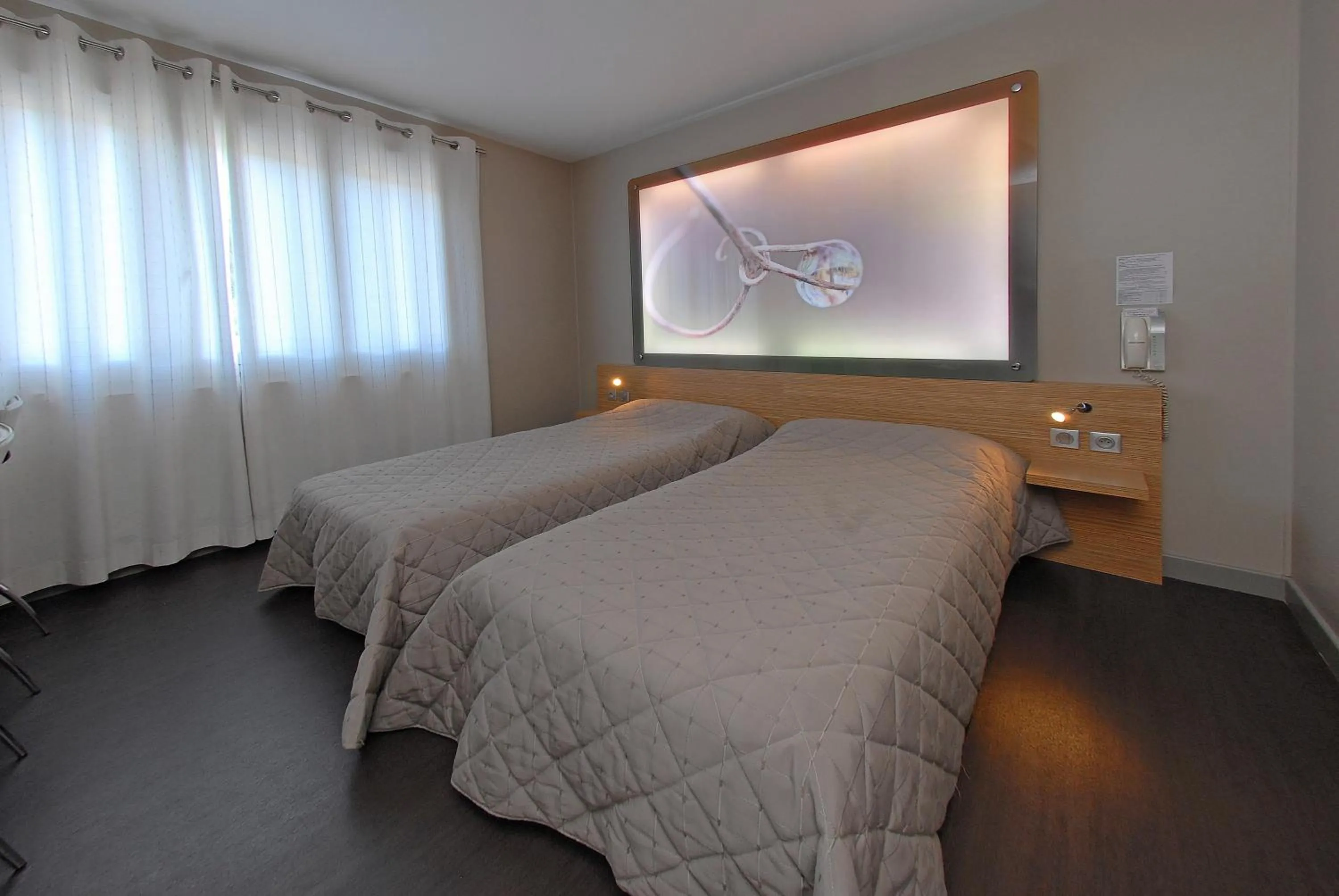 Bed in Logis Hotel Restaurant des Gorges du Tarn