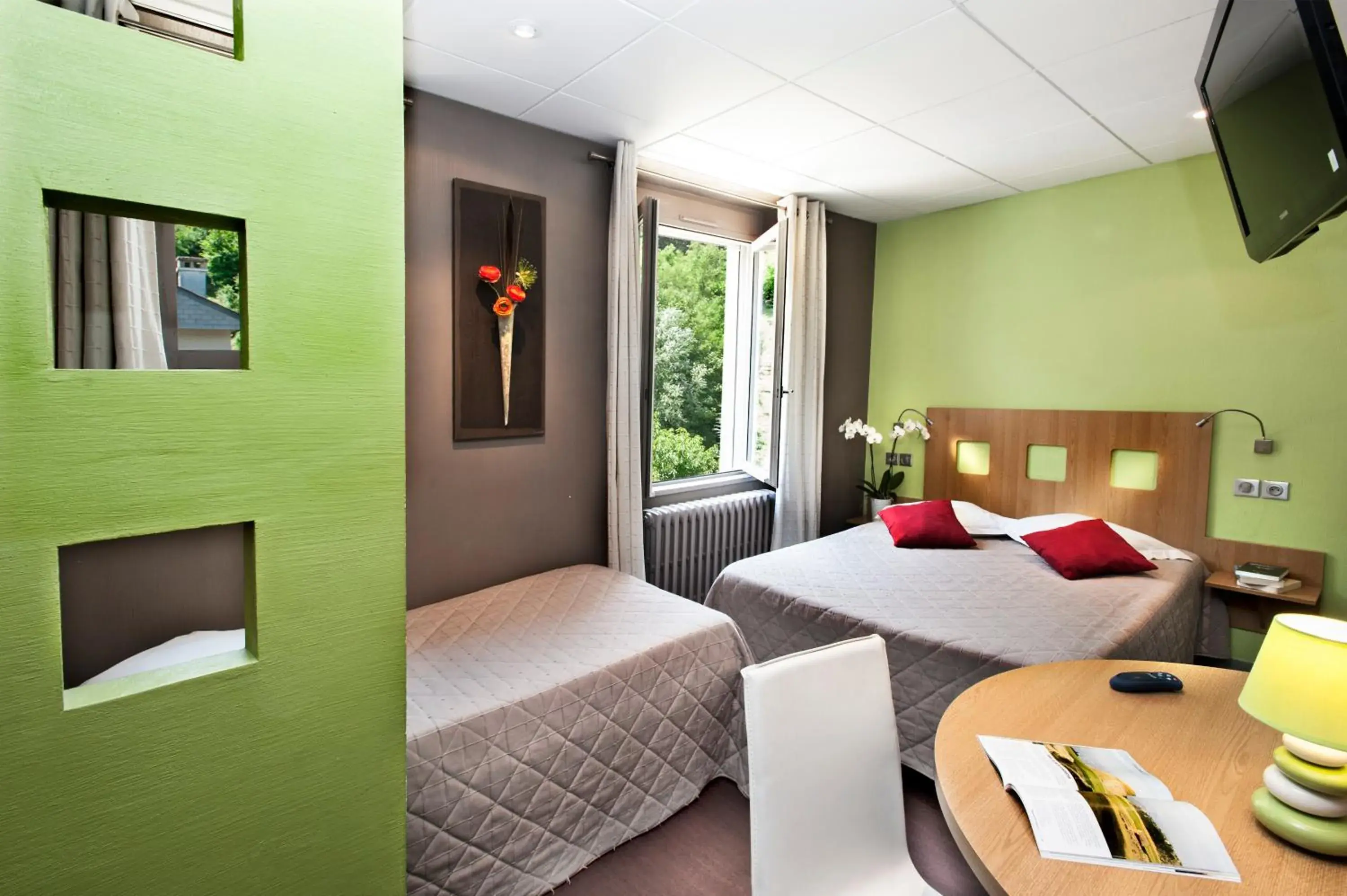 Bed in Logis Hotel Restaurant des Gorges du Tarn Bed in Logis Hotel Restaurant des Gorges du Tarn