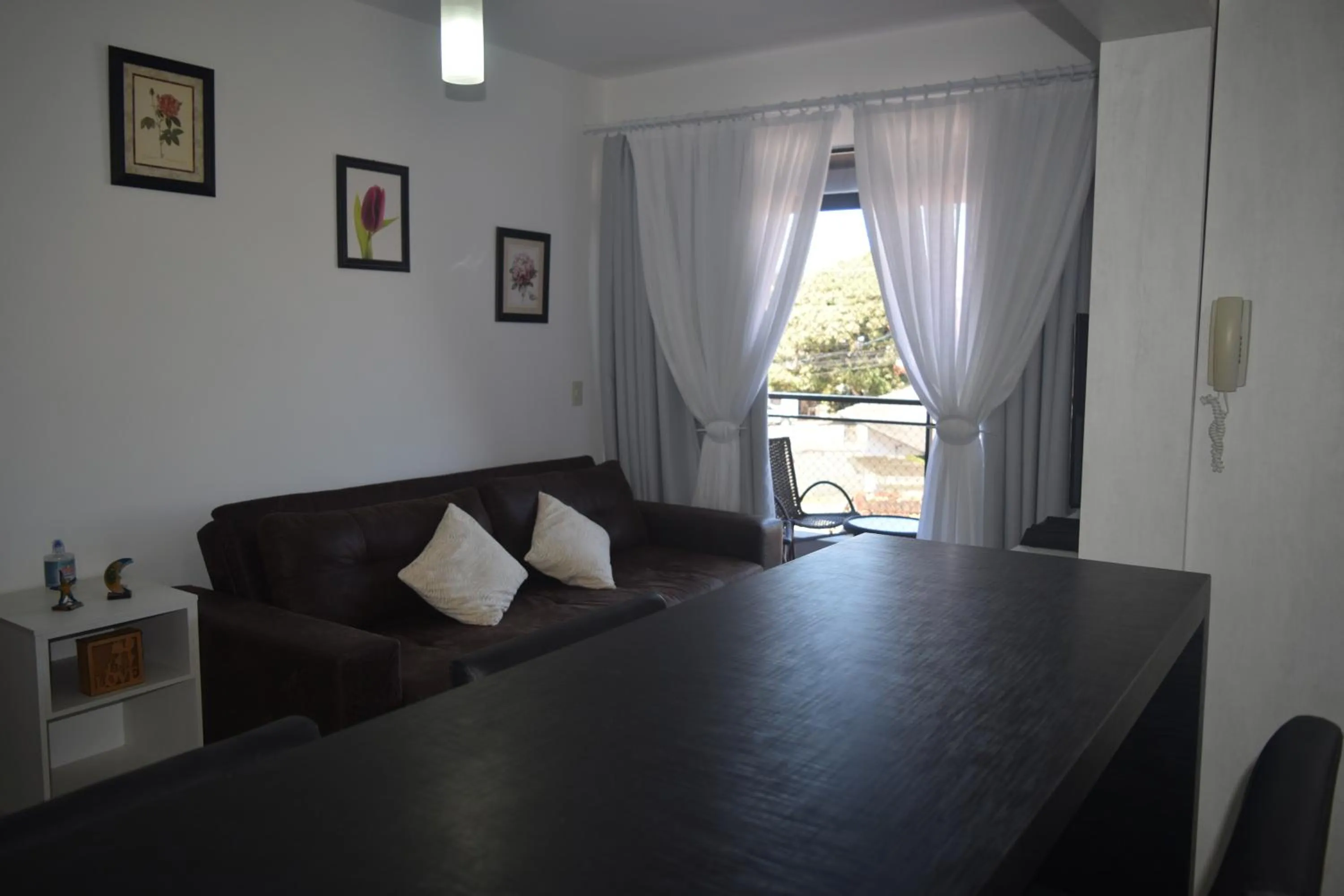 Seating area in Apartamento Temporada na Praia