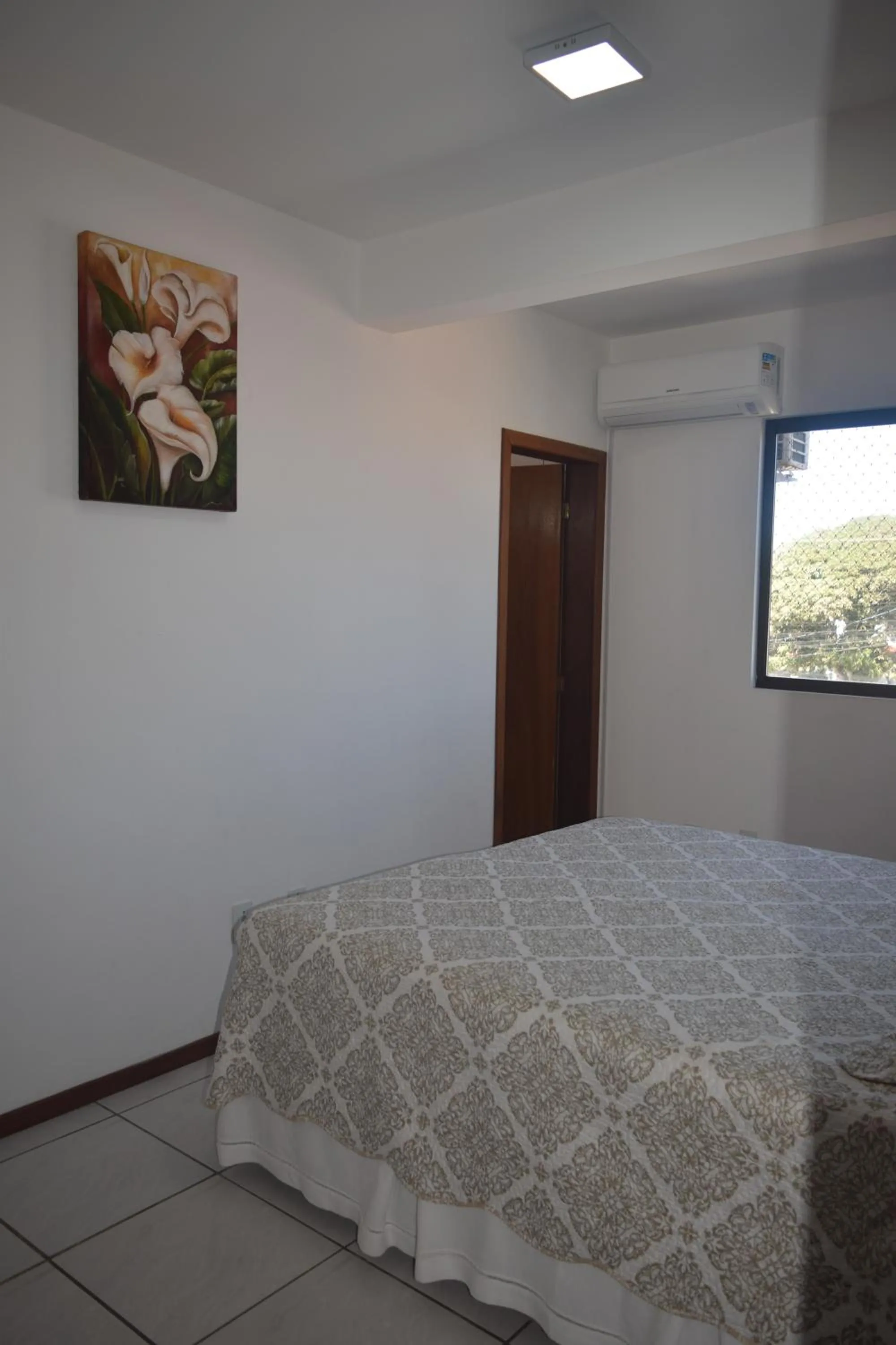 Photo of the whole room, Bed in Apartamento Temporada na Praia
