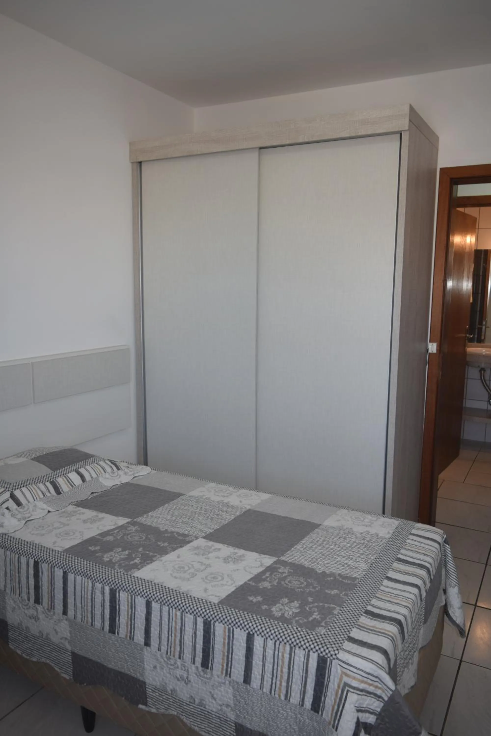 Bedroom, Bed in Apartamento Temporada na Praia