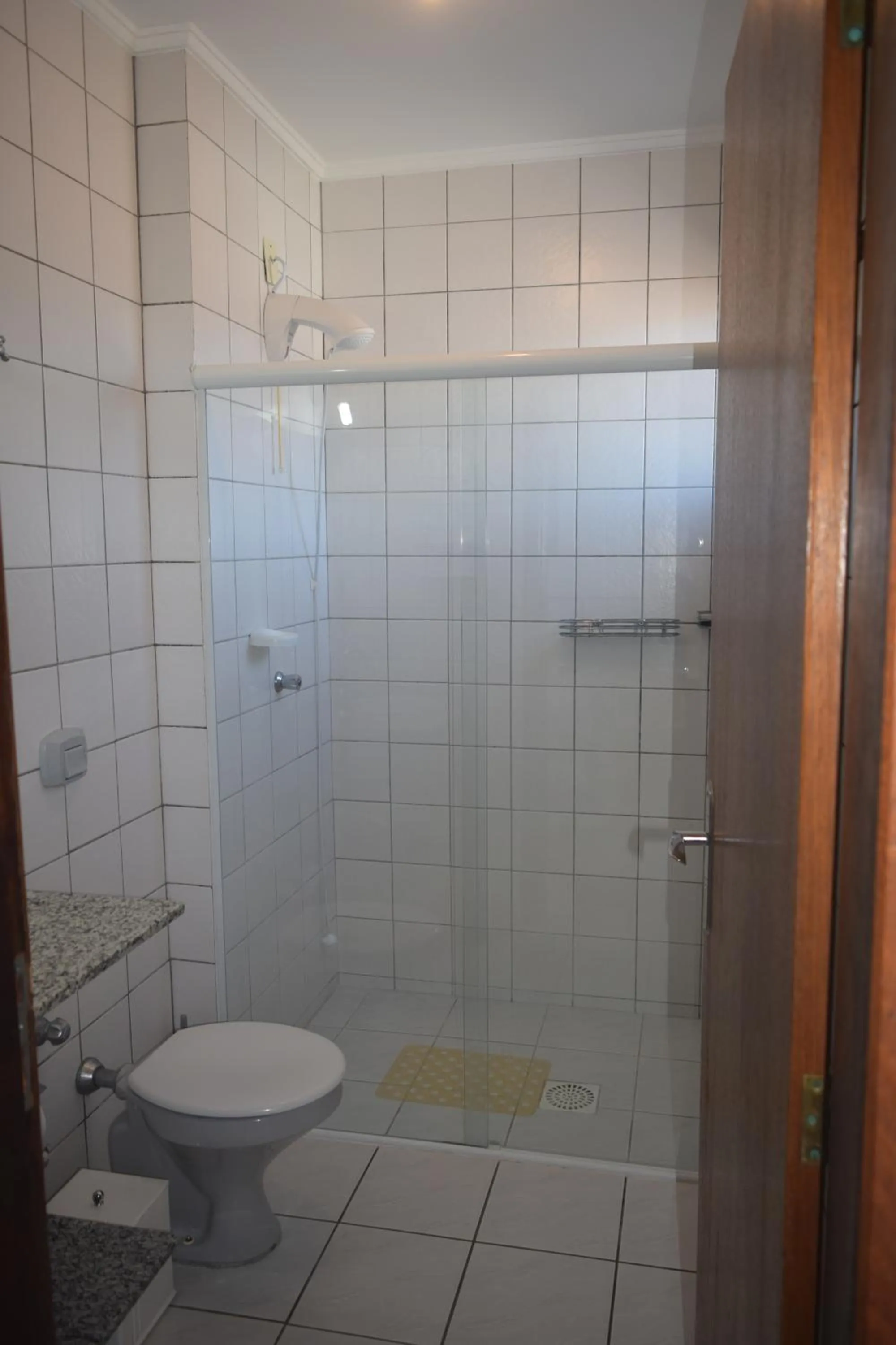Shower in Apartamento Temporada na Praia