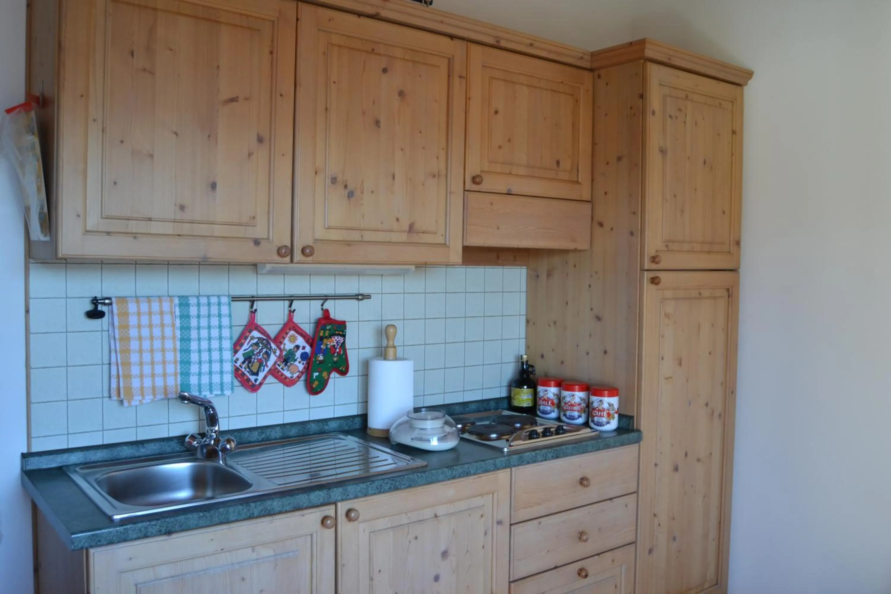 Kitchen or kitchenette in Giongo Residence - Appartamenti